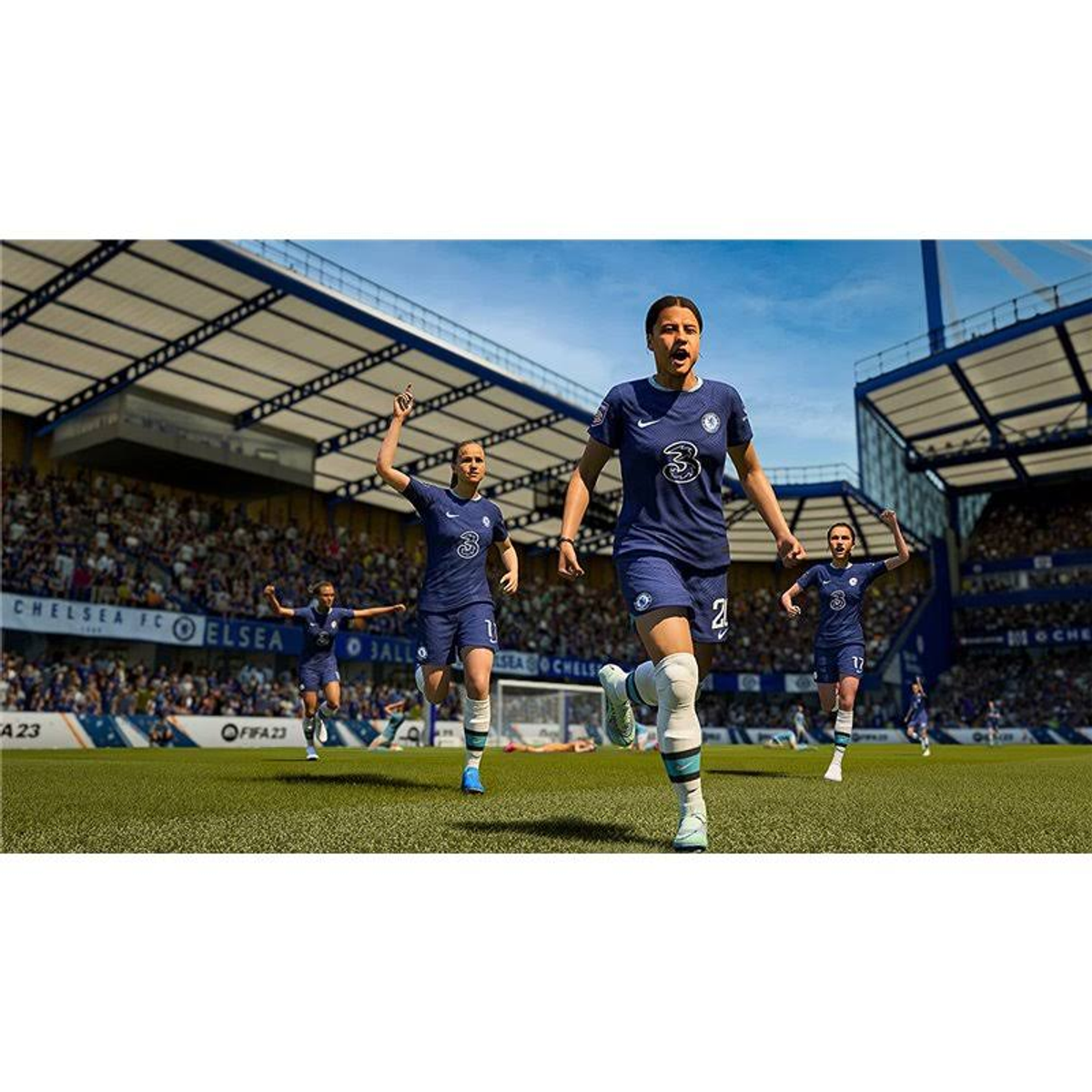 Una escena de juego de fútbol con el equipo femenino del Chelsea FC celebrando un gol en el campo.