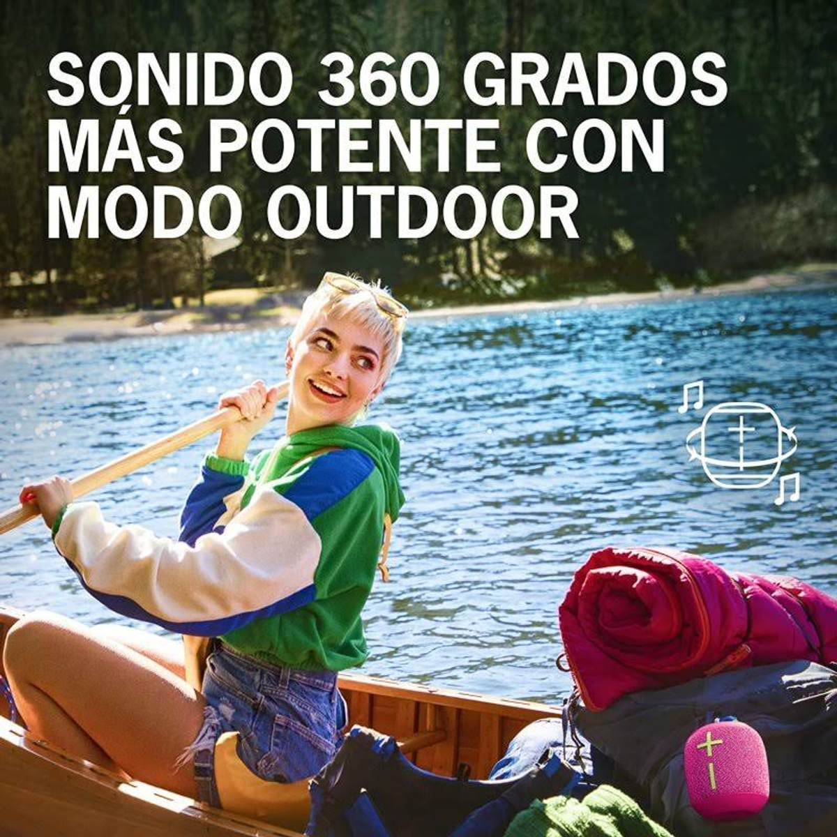 Kobieta wiosłuje w łodzi z głośnikiem i śpiworem w tle. Nakładka tekstowa.