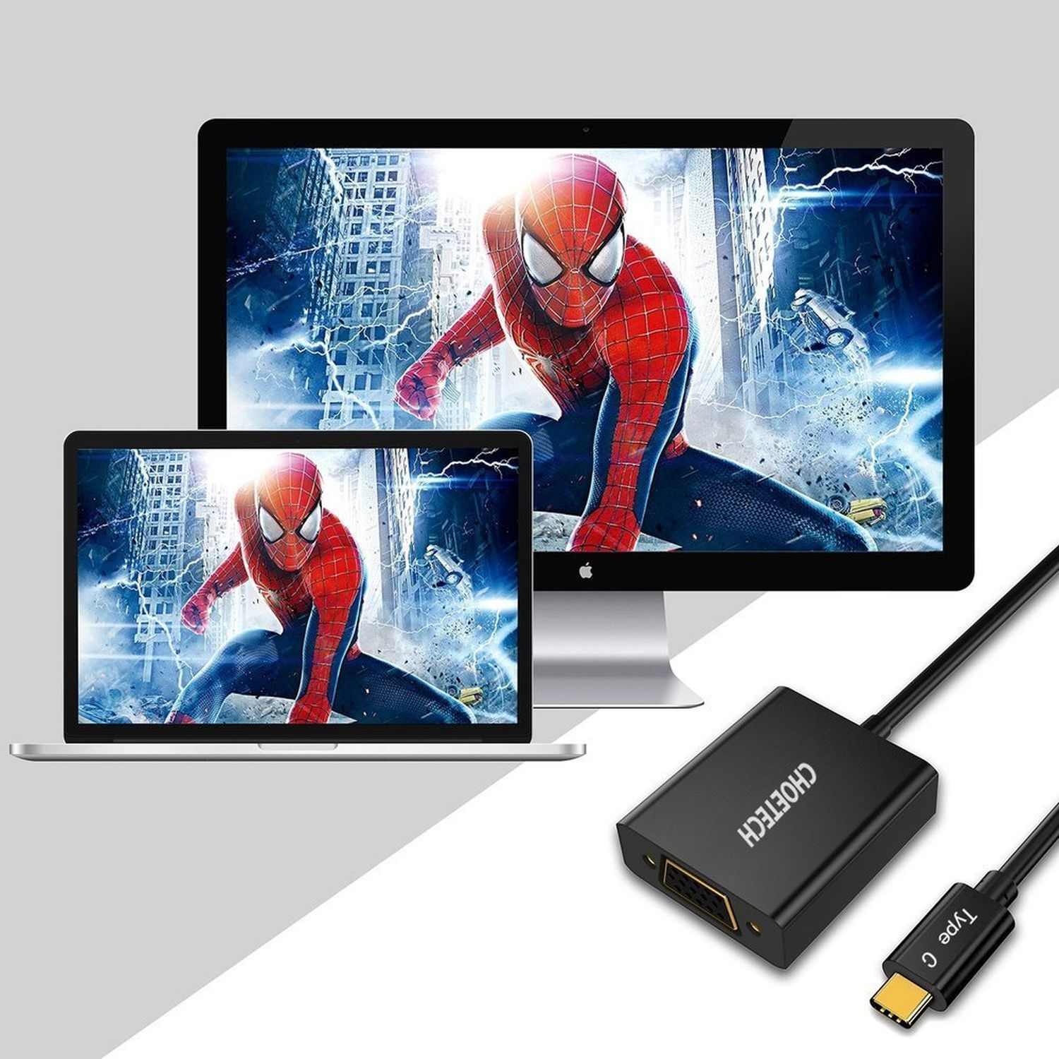 Laptop und Monitor mit Spider-Man. Schwarzer Adapter und Kabel mit Typ-C-Anschluss.
