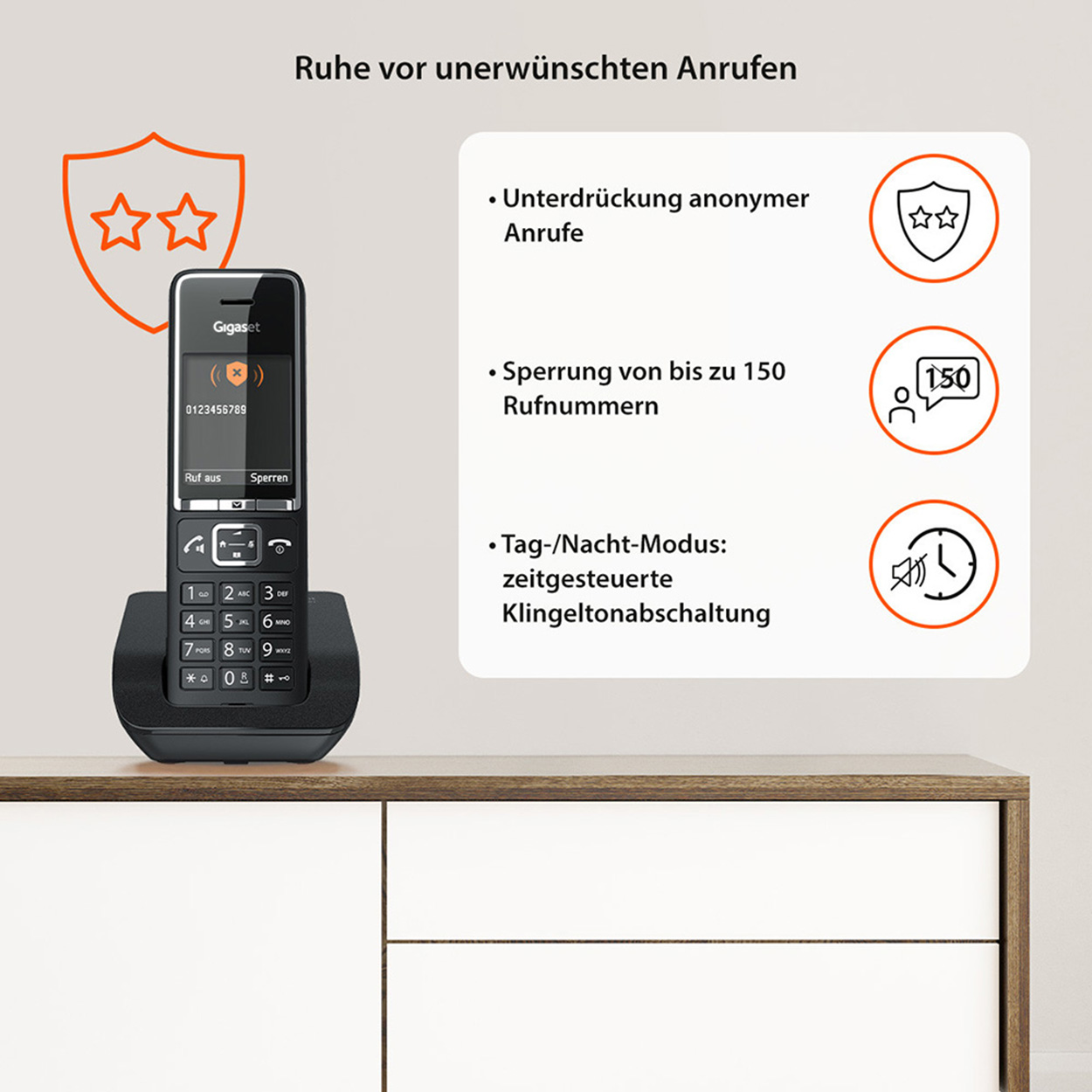 Telefono fisso nero con base. Testo e icone vengono visualizzati.