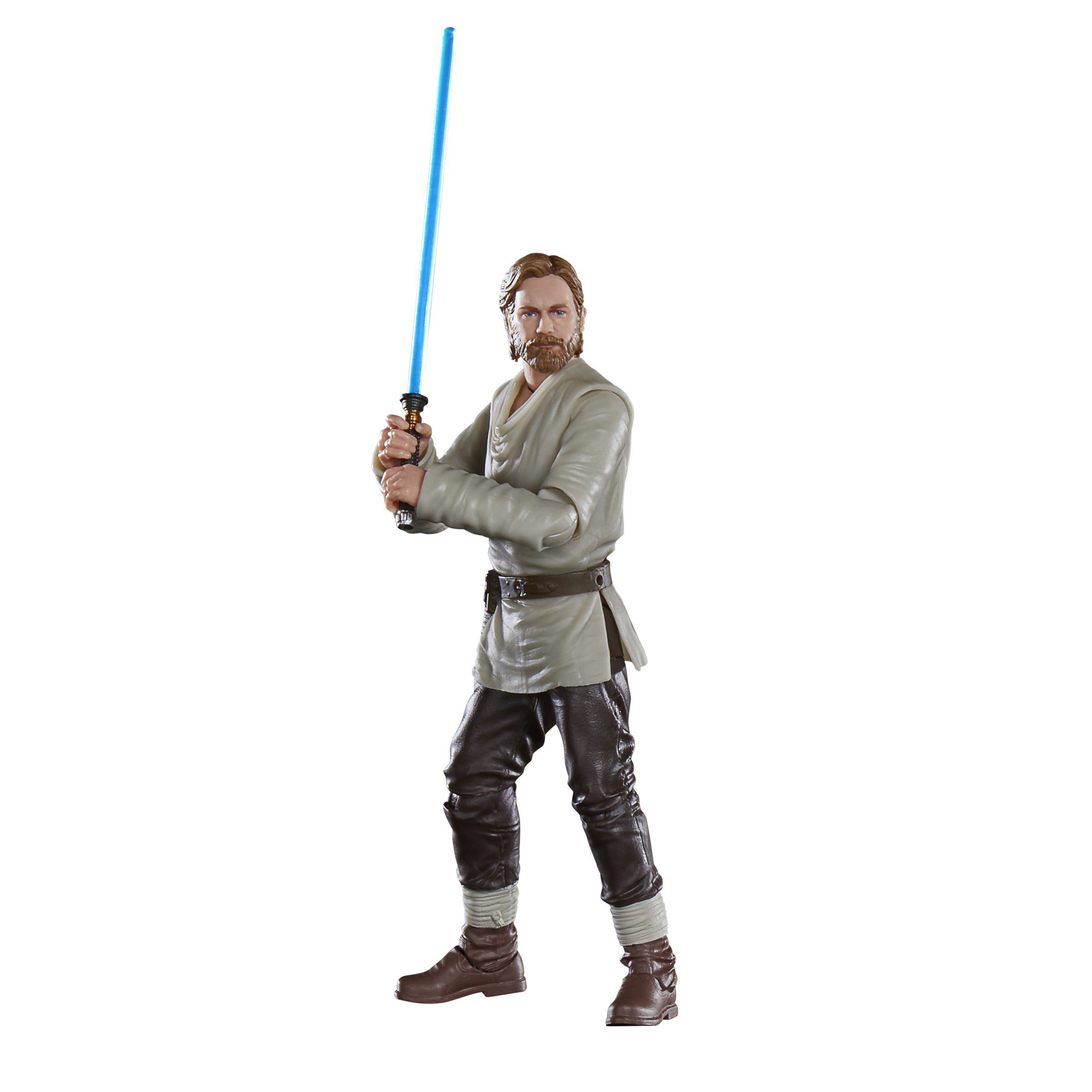 Figura de acción de Obi-Wan Kenobi sosteniendo un sable de luz azul. Lleva pantalones marrones.