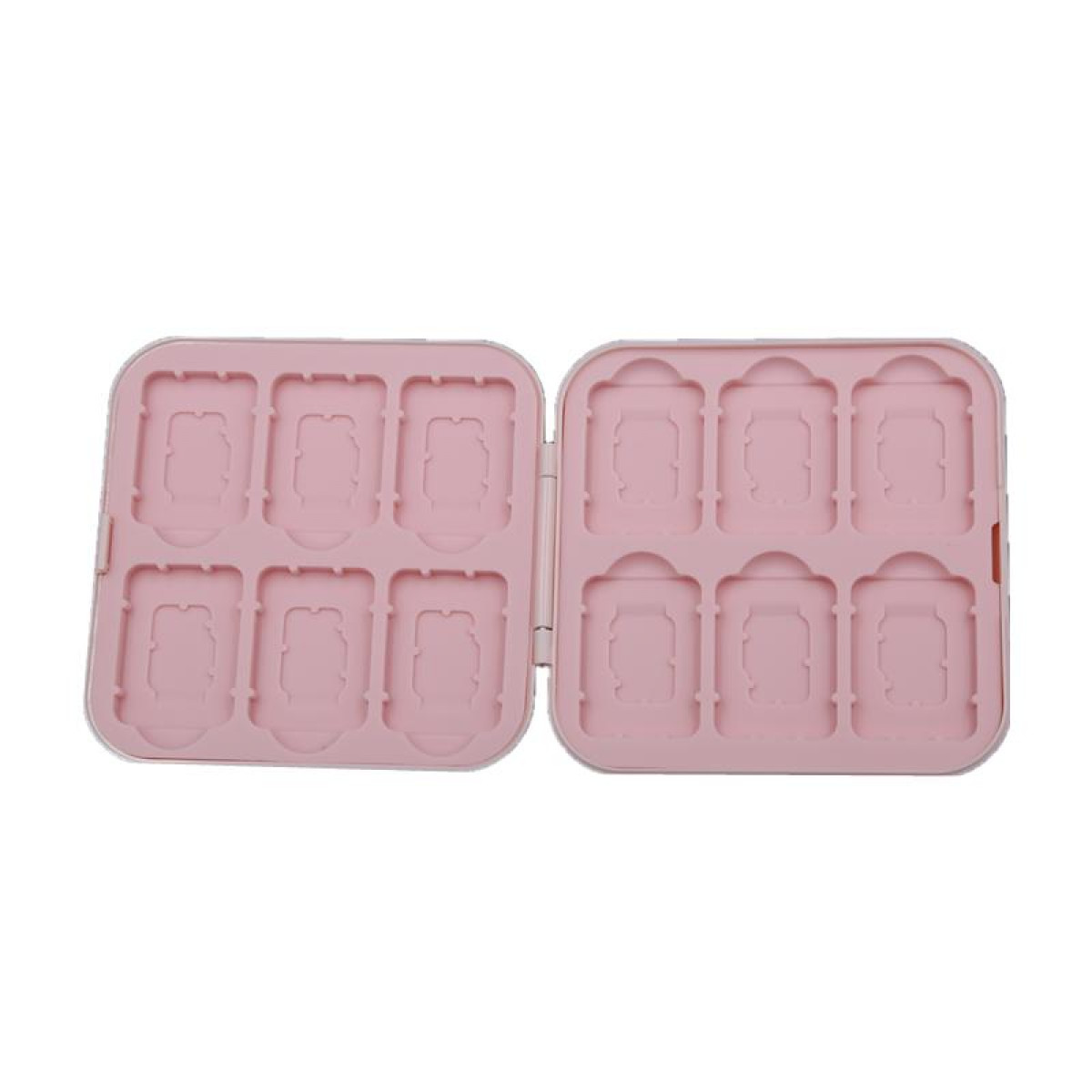 A pink storage case, open, with slots for storing small items.