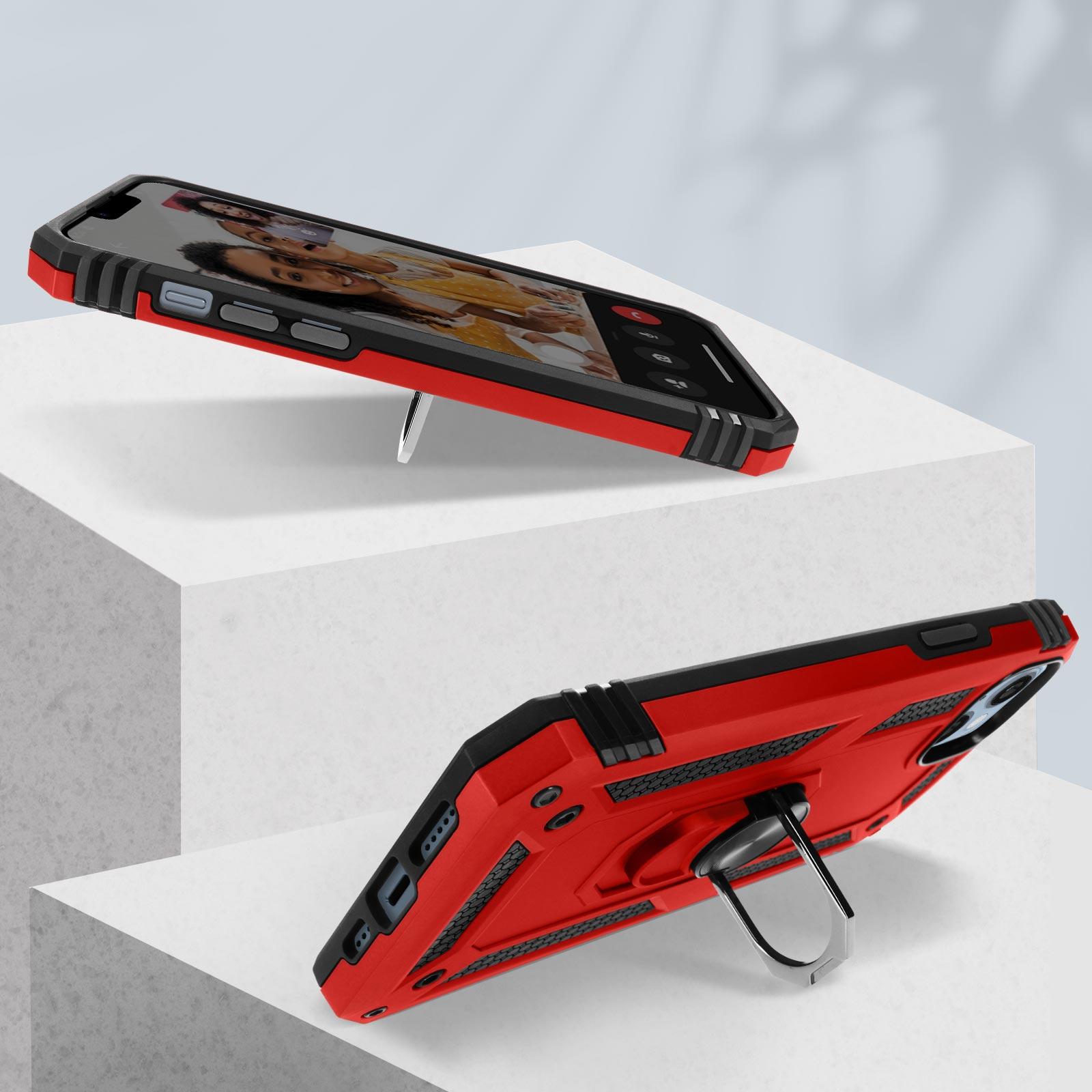 Deux téléphones, étuis rouges et noirs, sur surface blanche. Un debout, l'autre horizontal.