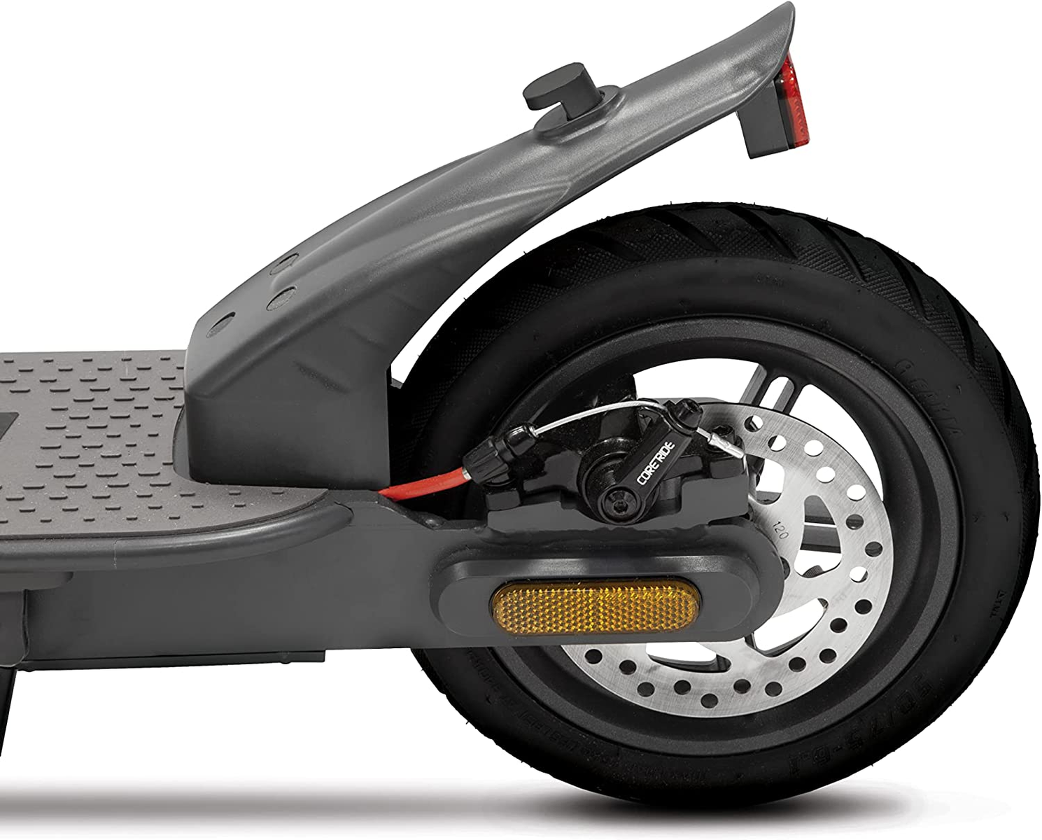 Zbliżenie szarego koła skutera i hamulca tarczowego.