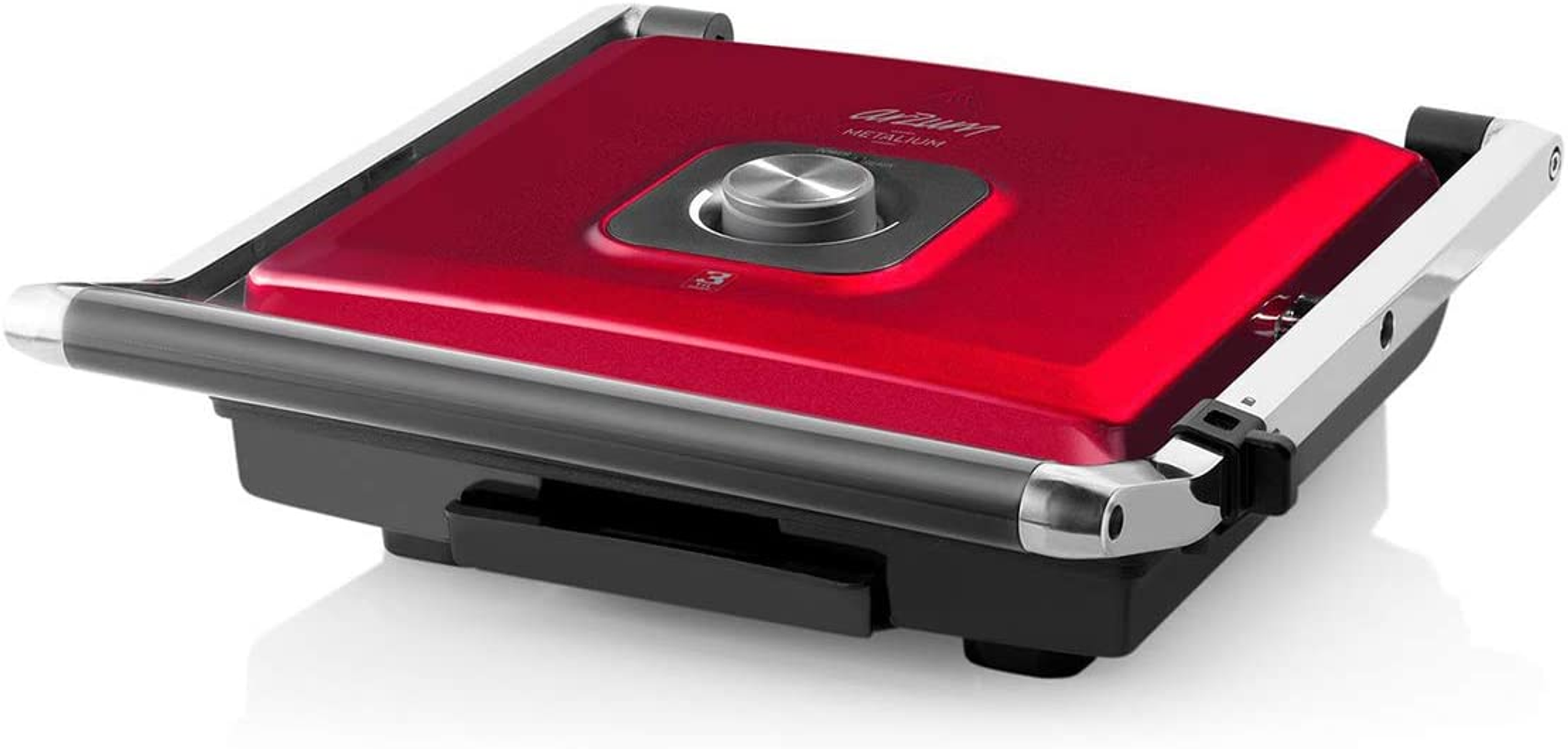 Una pressa per panini rossa. Ha una base nera e una maniglia argentata. La parte superiore è chiusa.