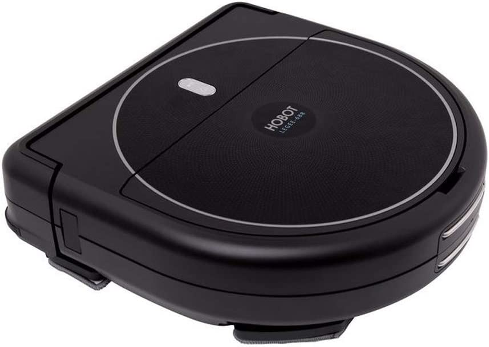 Un robot aspirador cuadrado negro con un diseño circular en la parte superior.