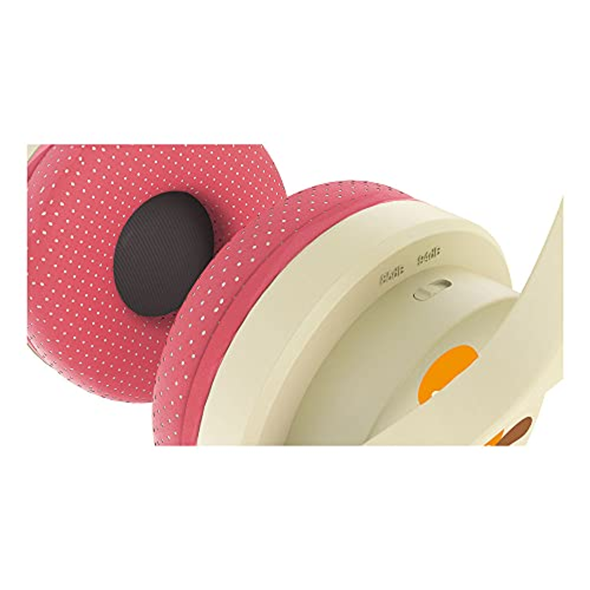 Zbliżenie na różową i białą słuchawkę w kropki. Widoczny jest mały przełącznik sterowania.