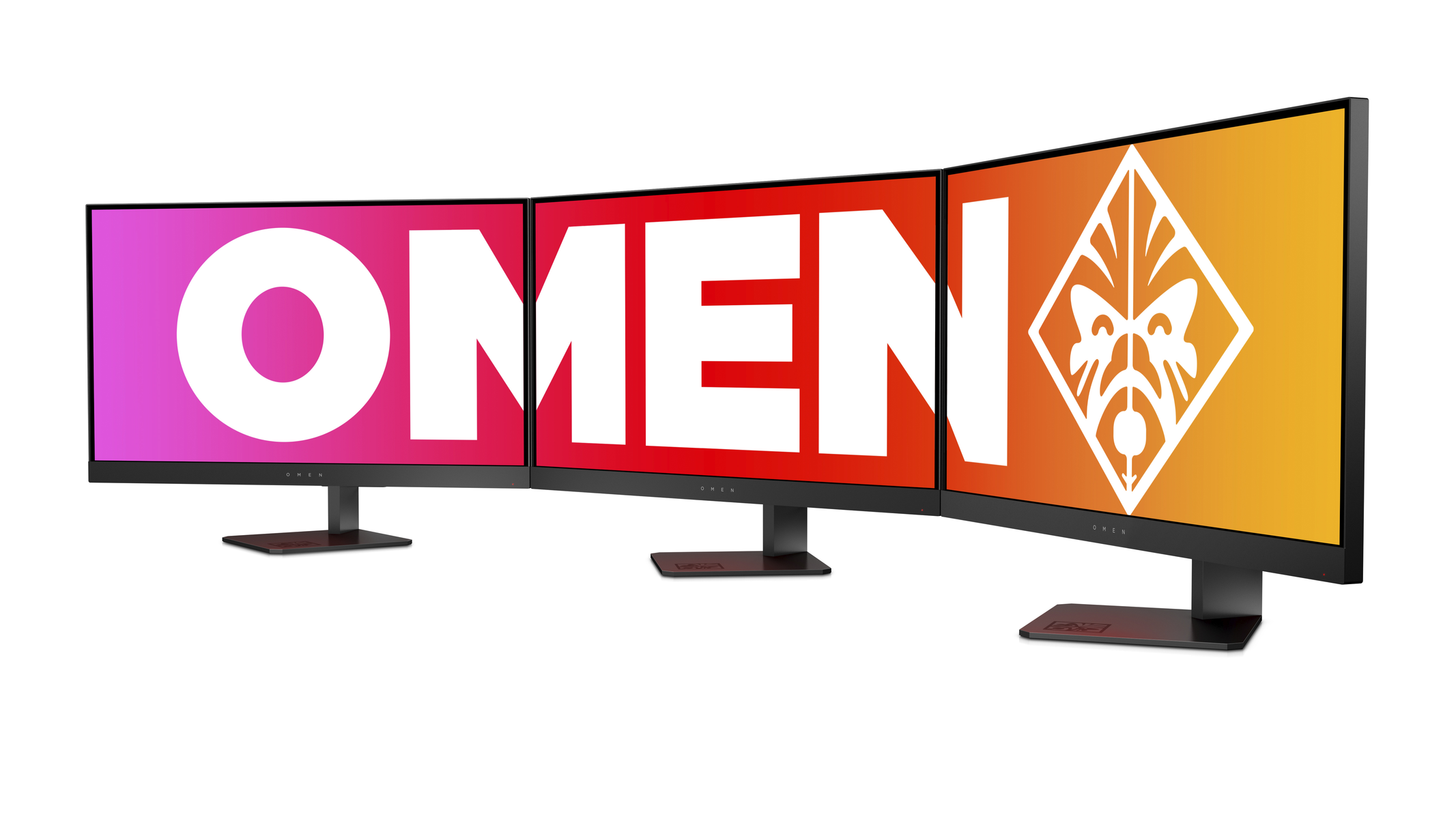 Trzy monitory OMEN obok siebie. Każdy wyświetla inne kolorowe tło. Logo OMEN znajduje się na środku.