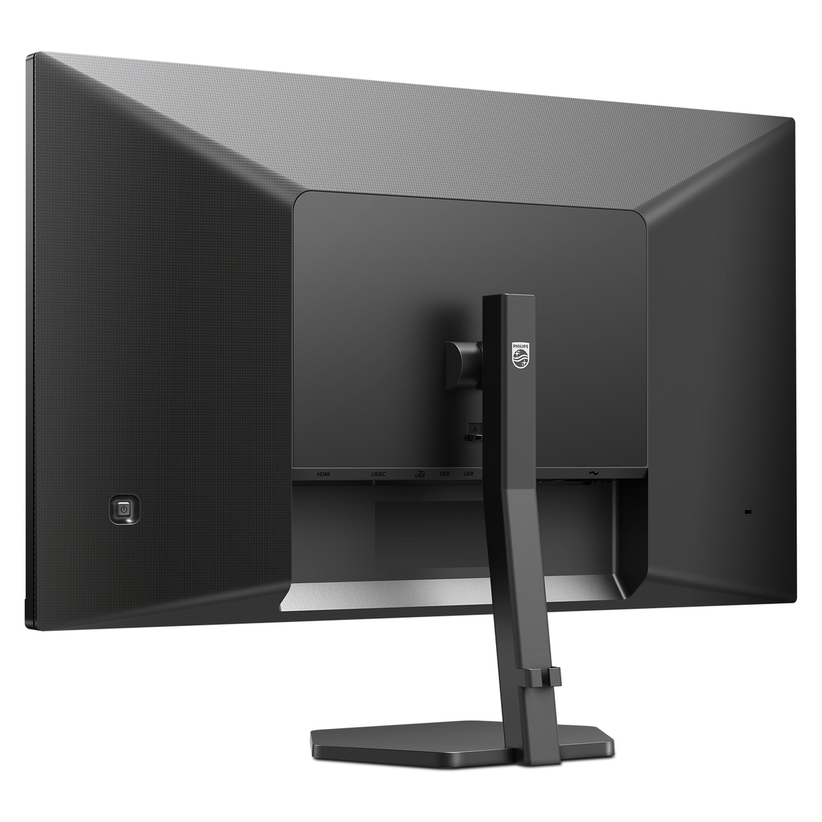 Vista posteriore di un monitor nero. Ha porte e un supporto.