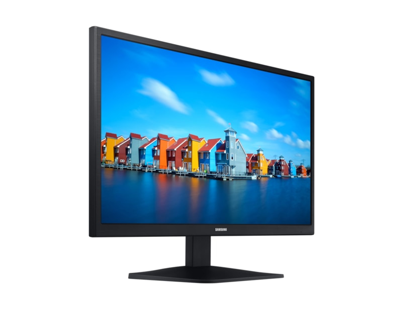 Monitor nero che mostra case colorate, con sfondo cielo blu.