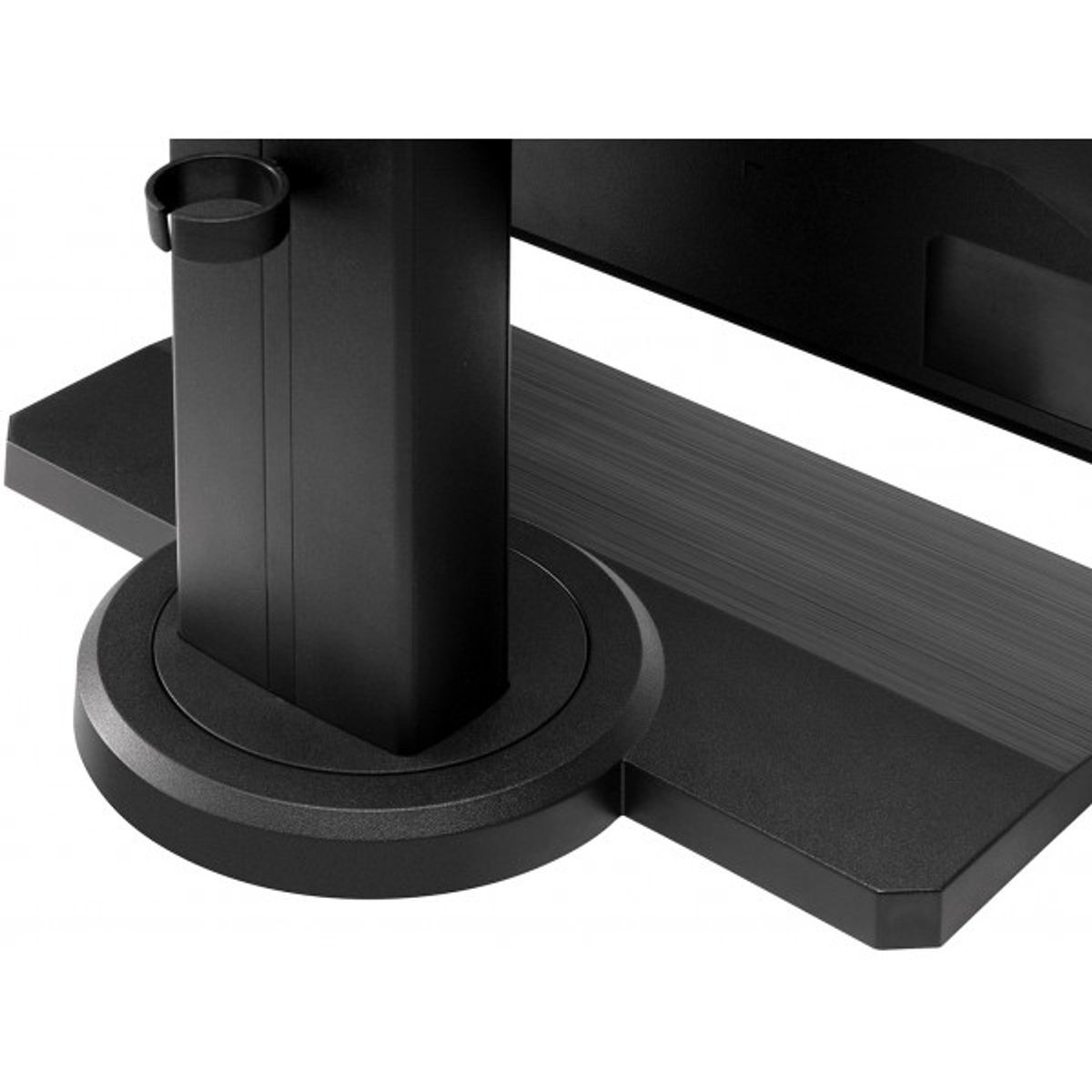 Primo piano della base di un supporto per monitor nero, design circolare.