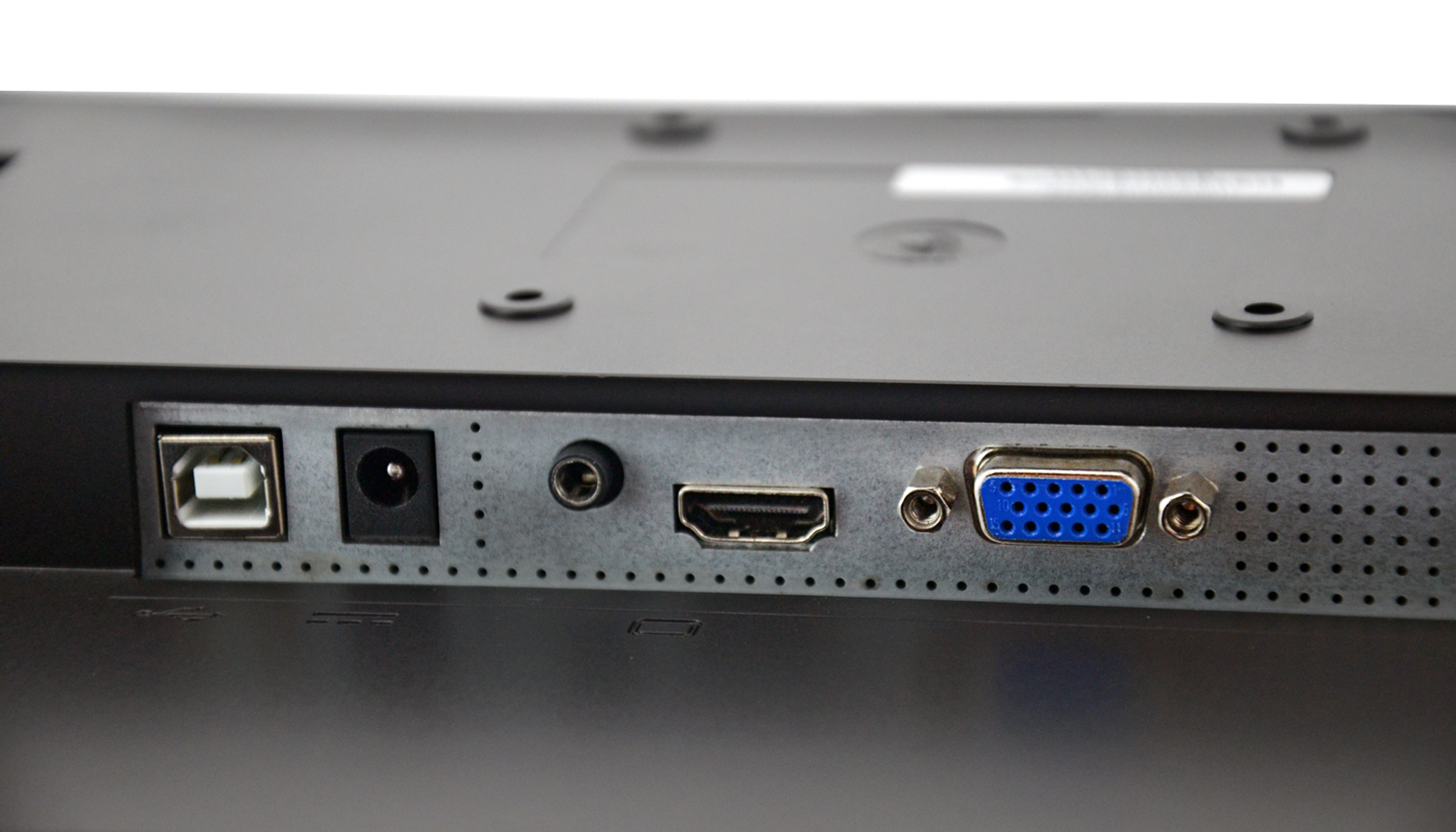 La parte trasera de un monitor negro con puertos USB, alimentación, audio, HDMI y VGA.