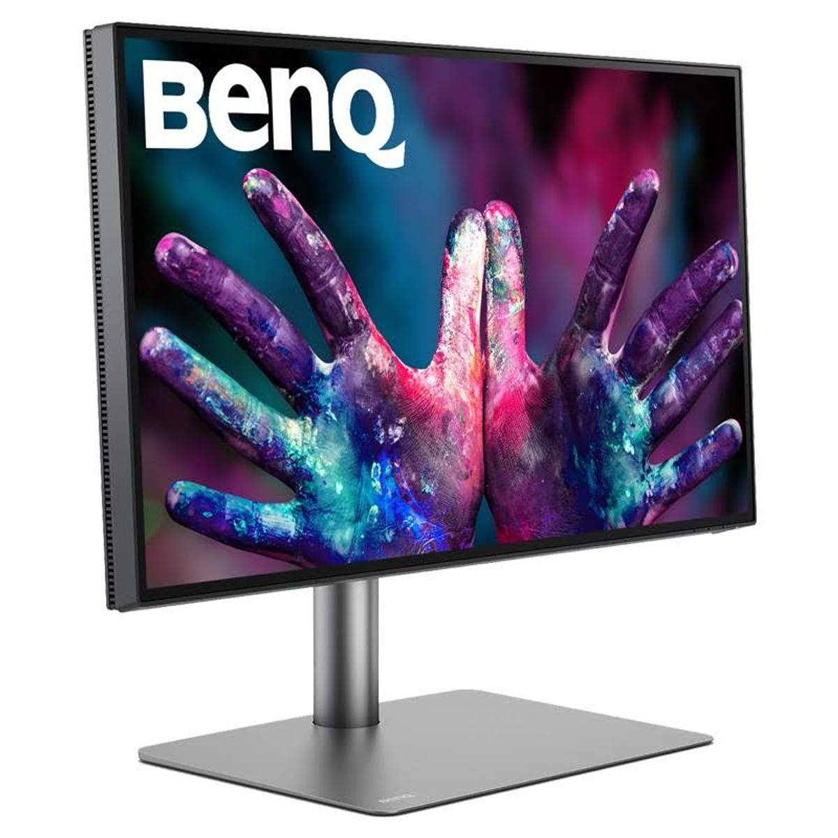 Monitor BenQ na podstawce, dłonie z kolorową farbą na ekranie.