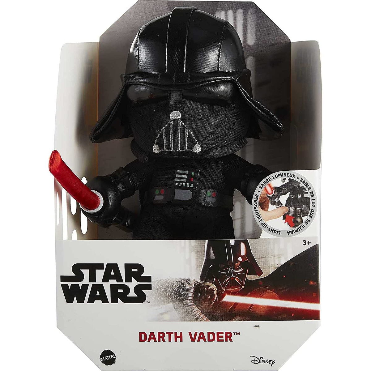 Figura de juguete de Darth Vader en una caja. Cuenta con un sable de luz que se ilumina. Marca Star Wars visible.