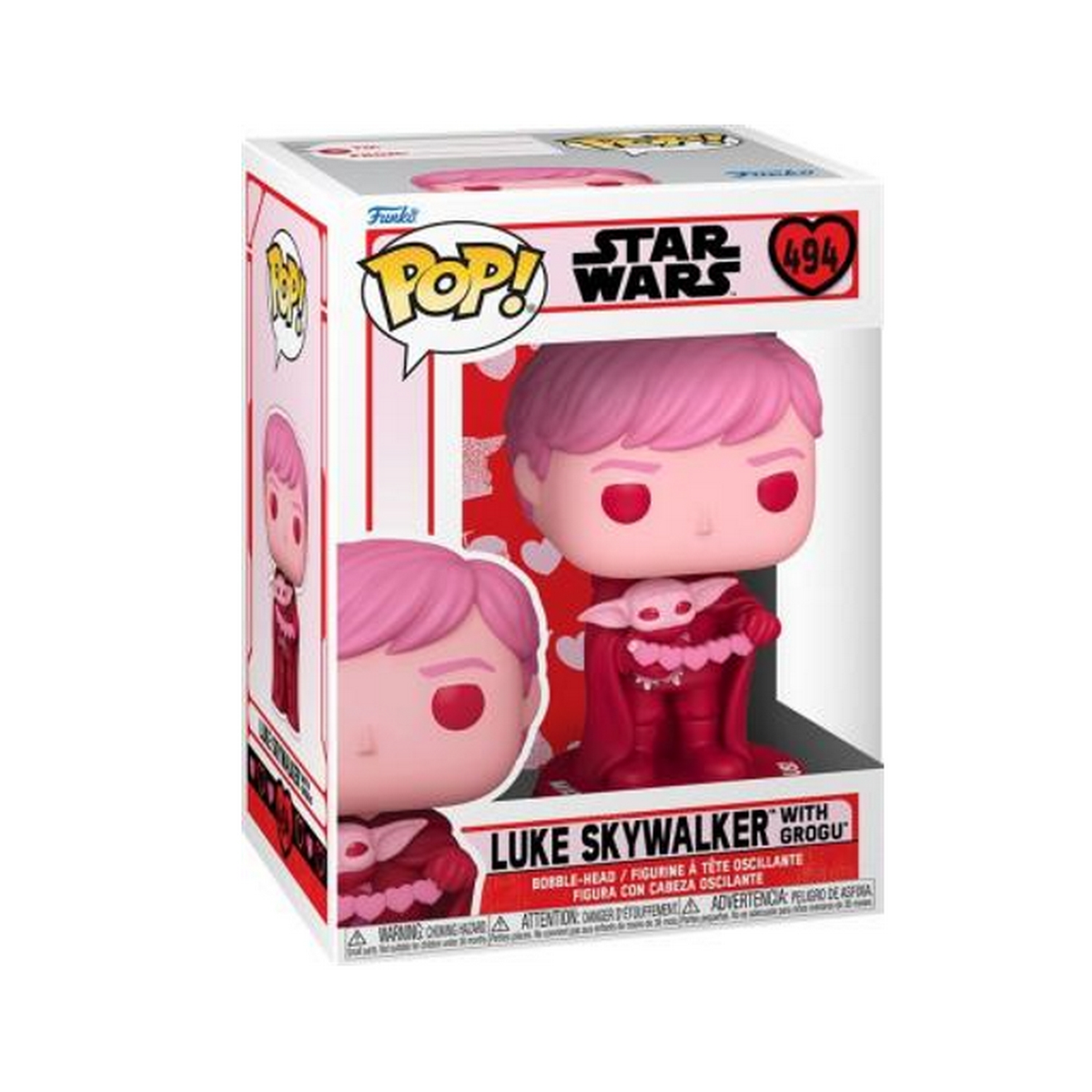 Caja Funko Pop de Luke Skywalker con Grogu. Figura en caja. Colores rosa y rojo.