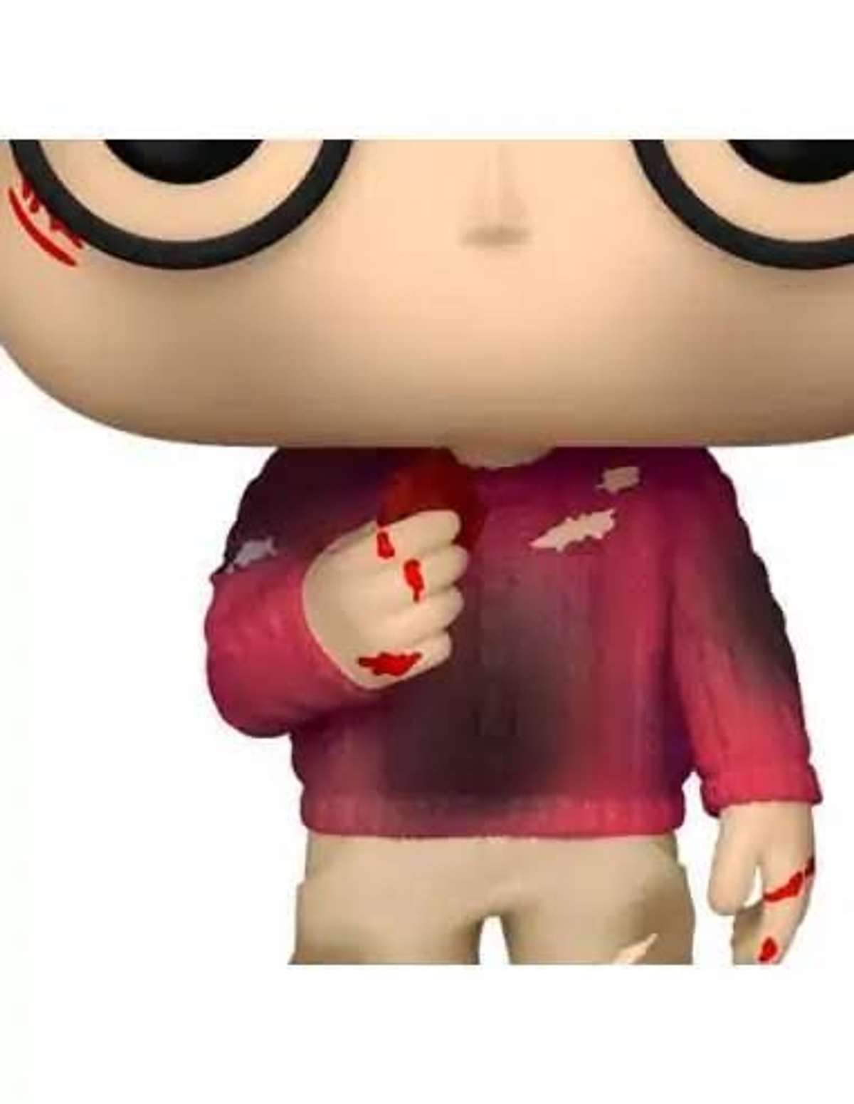 Una figura Funko Pop insanguinata, una bambola con macchie di sangue.