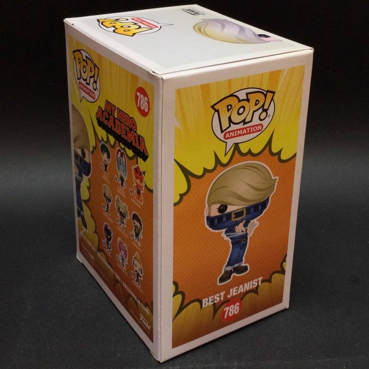 Una scatola Funko Pop con una figura di Best Jeanist di My Hero Academia. La scatola è colorata.