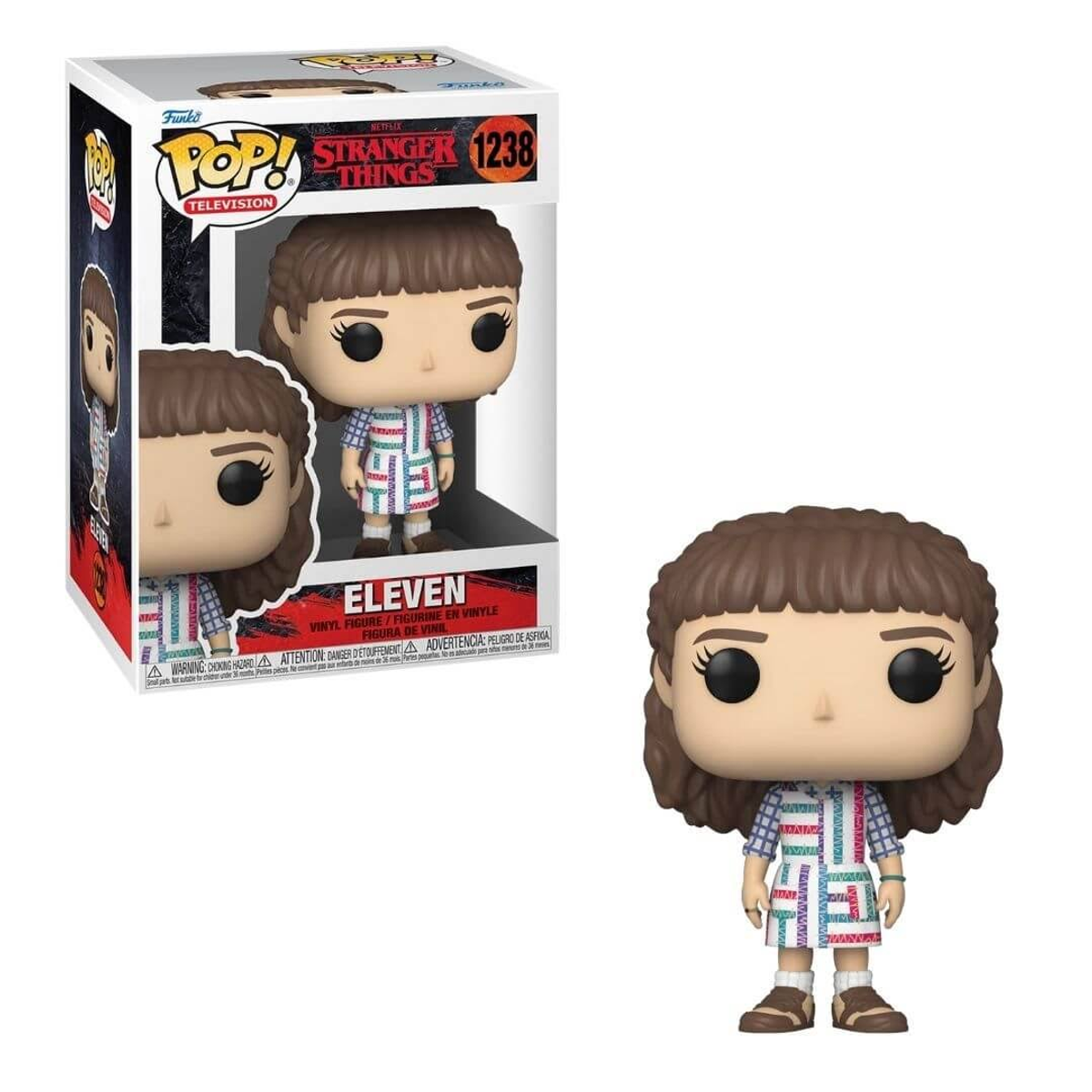 Figura Funko Pop di Undici di Stranger Things, dentro e fuori dalla scatola. Undici tiene un waffle.