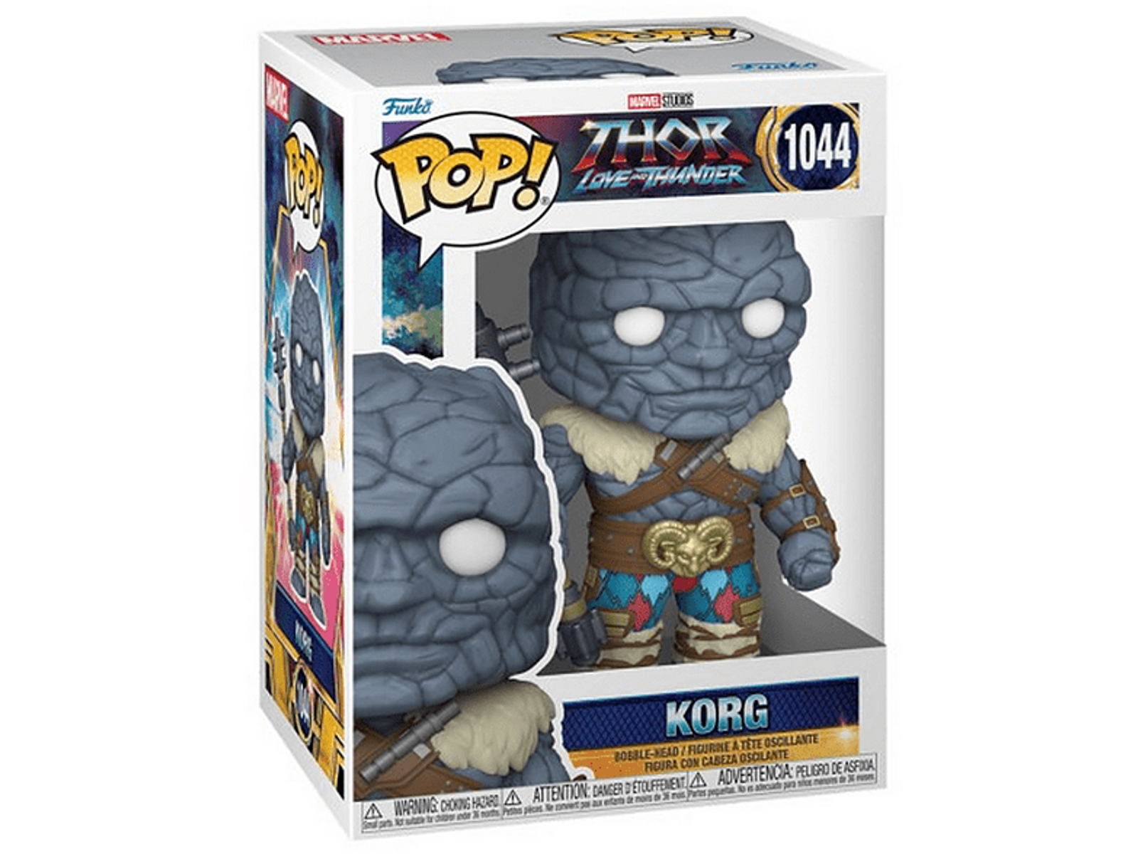 Figura Korg Funko Pop in una scatola. La figura è grigia, con una texture di pietra e un'armatura. Sfondo bianco.