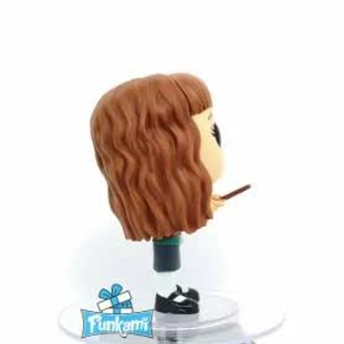 Vista laterale di una figura Funko Pop. La figura ha capelli castani e tiene una bacchetta.
