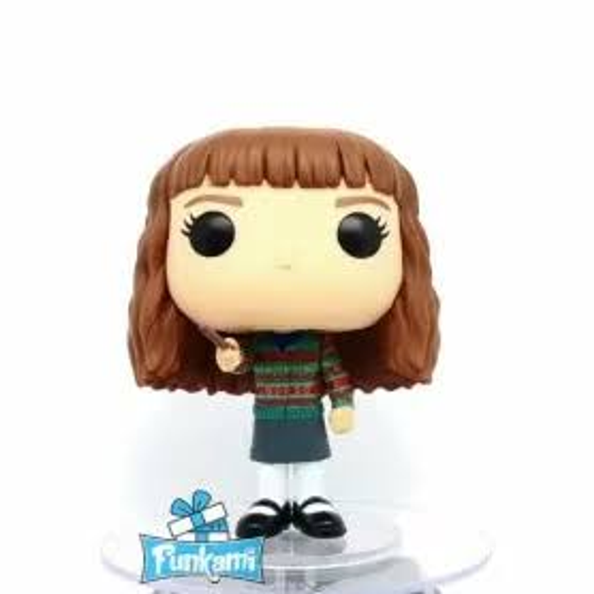 Funko Pop di Undici da Stranger Things. Capelli castani, tiene una bacchetta. Sfondo bianco.