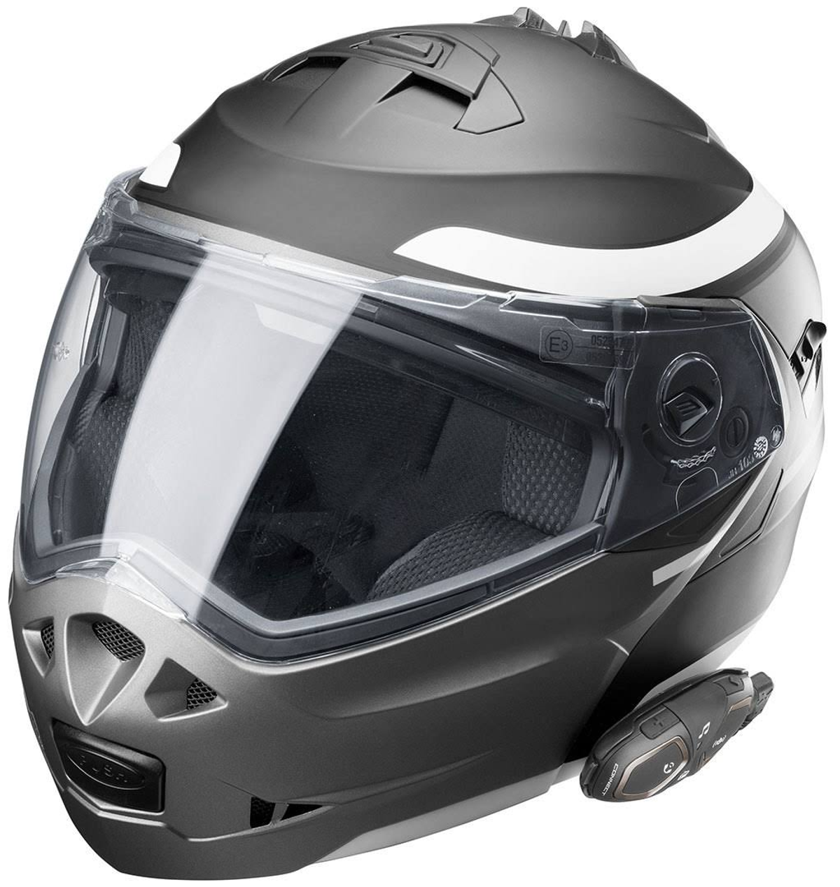 Casco da moto grigio scuro con visiera trasparente. Ha un dispositivo di comunicazione collegato.