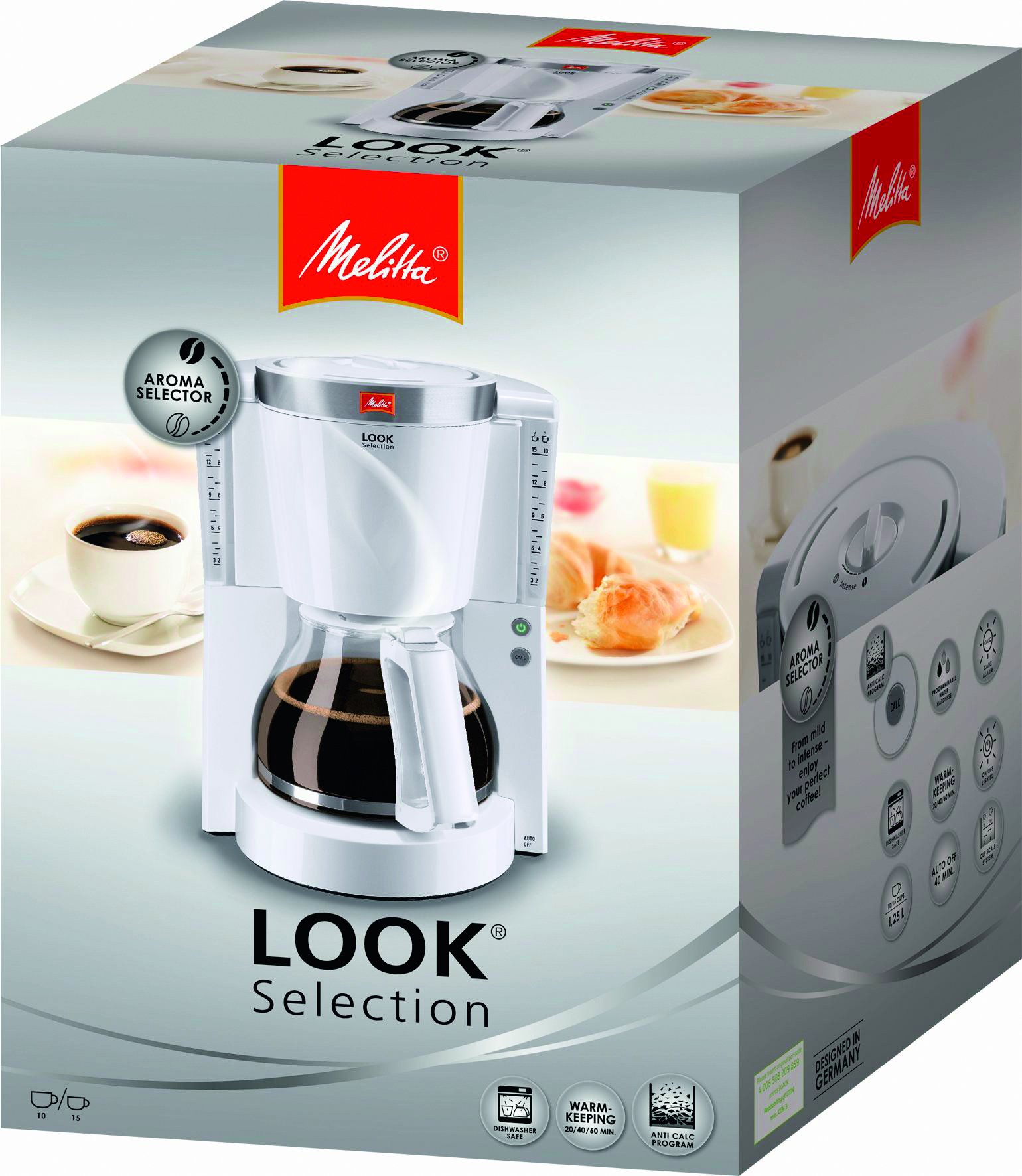 Macchina da caffè Melitta bianca in una scatola. La scatola mostra una tazza di caffè, un croissant e una caffettiera.