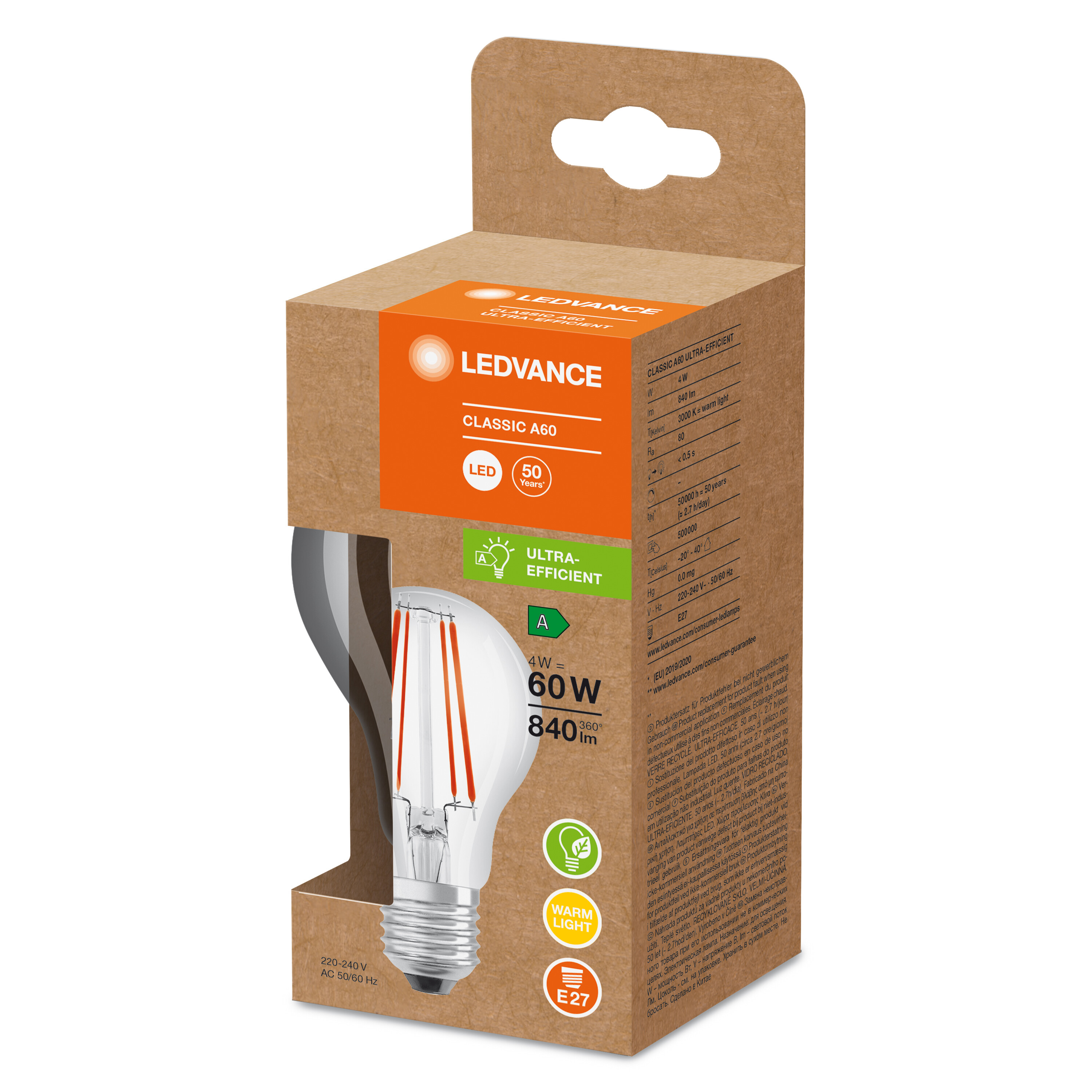 Żarówka w pudełku. Pudełko ma tekst i grafikę, widoczna jest żarówka z pomarańczowymi włóknami.