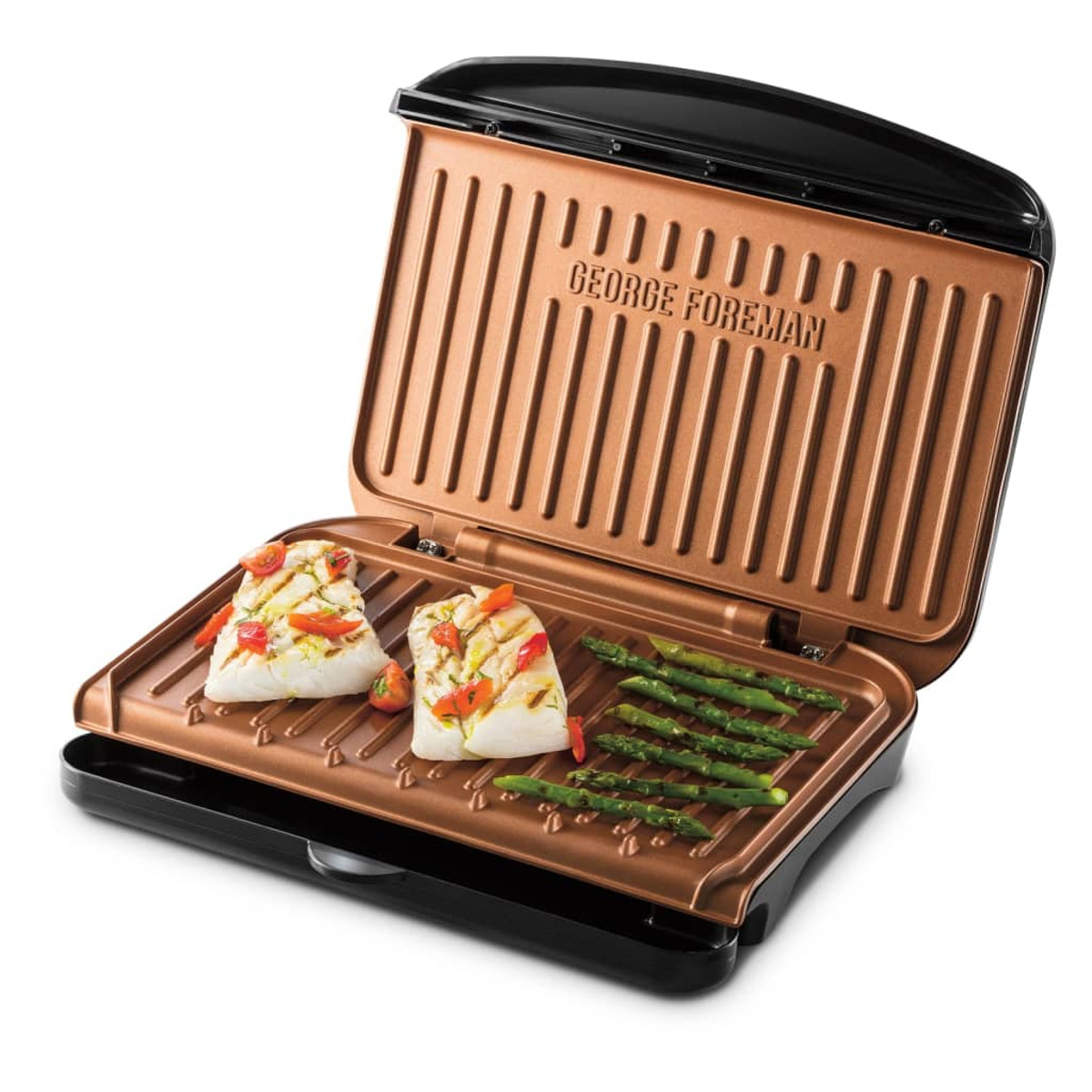 Otwarty grill miedziany George Foreman, z grillowaną rybą i szparagami w środku.