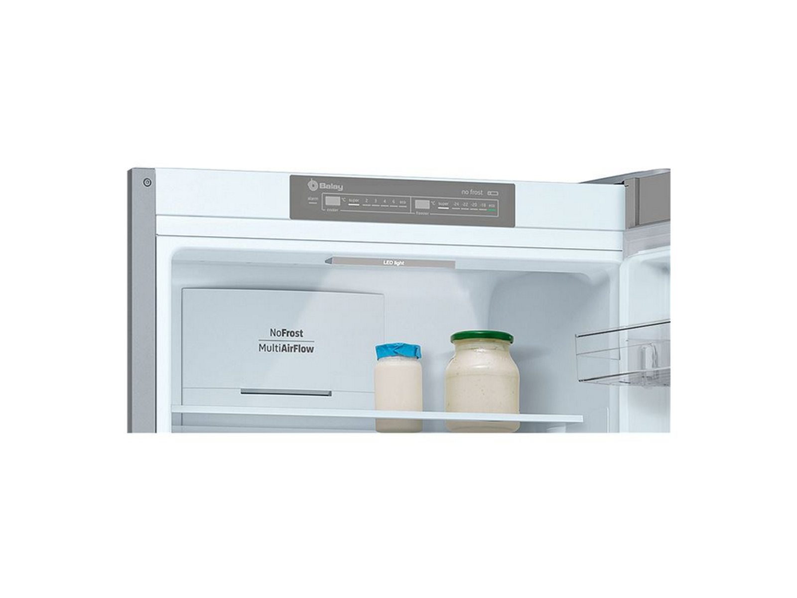 Interior de refrigerador con frascos y ajustes visibles. Caja: 'NoFrost MultiAirFlow'.