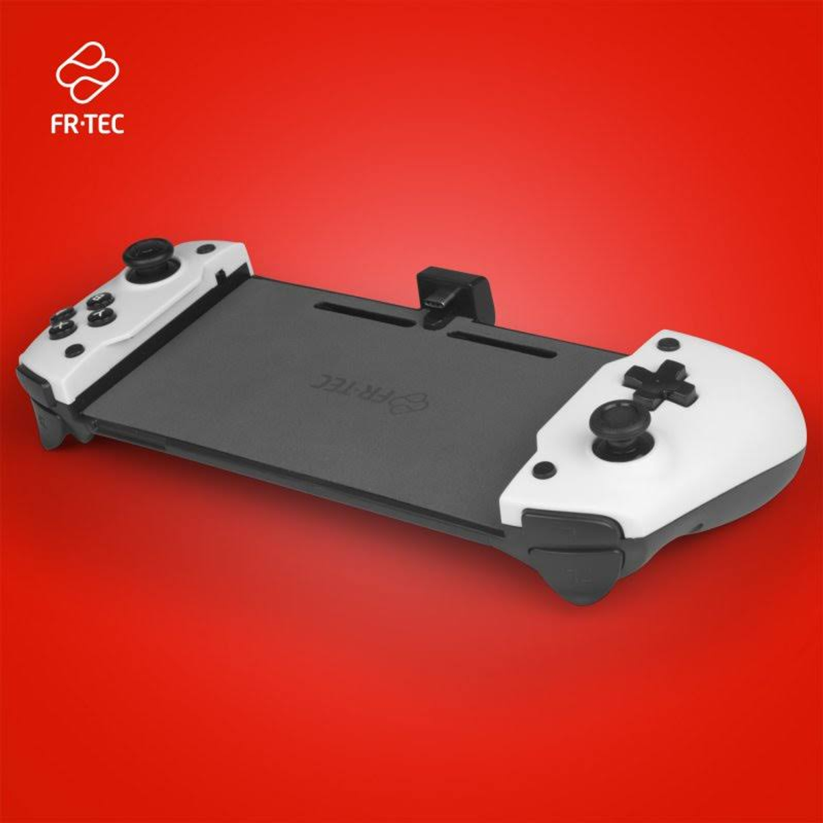 Ein weiß-schwarzer Gamecontroller, der an einem schwarzen Gerät auf rotem Hintergrund befestigt ist.