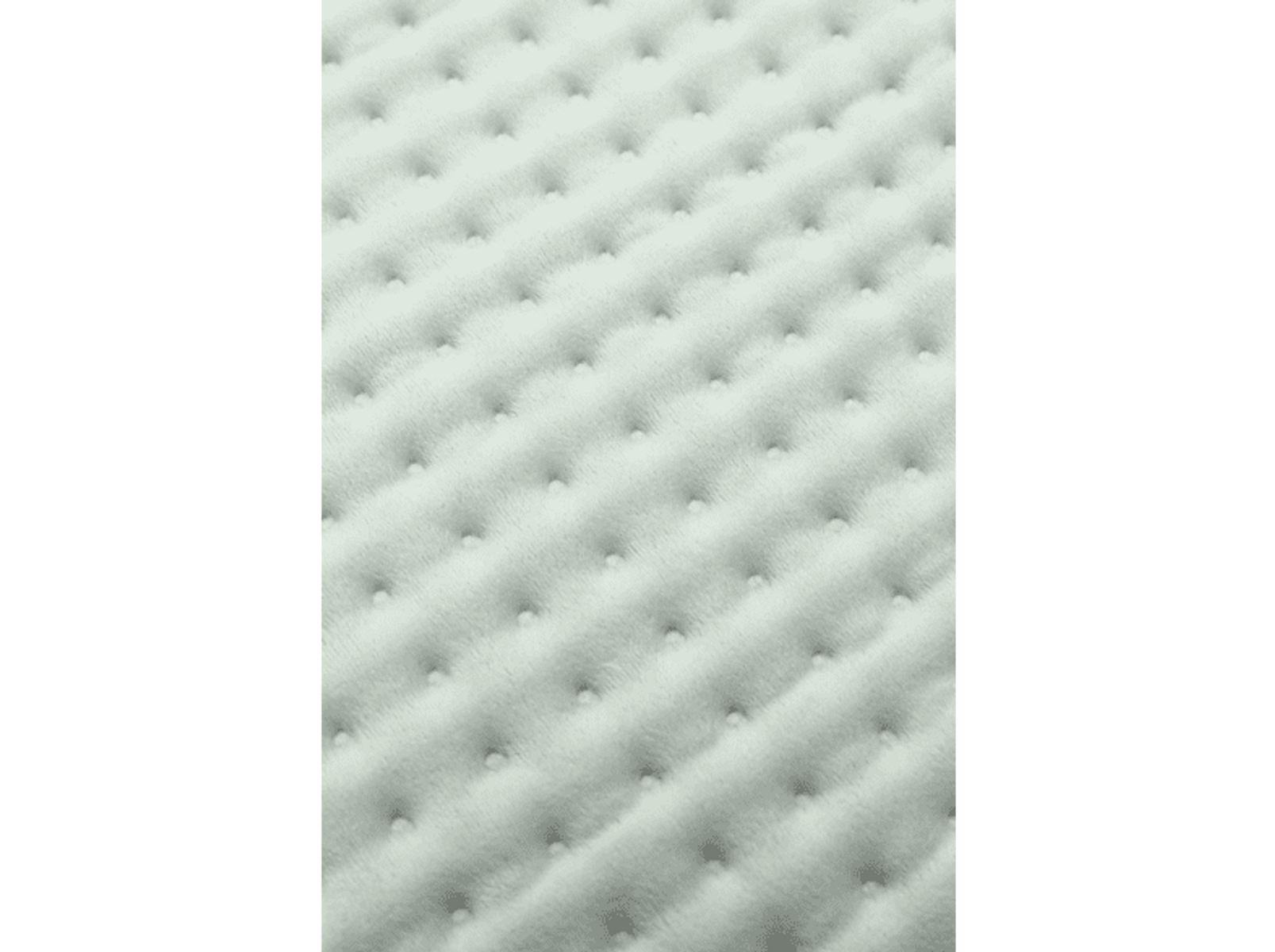Primer plano de una superficie blanca texturizada con protuberancias redondas pequeñas y espaciadas.