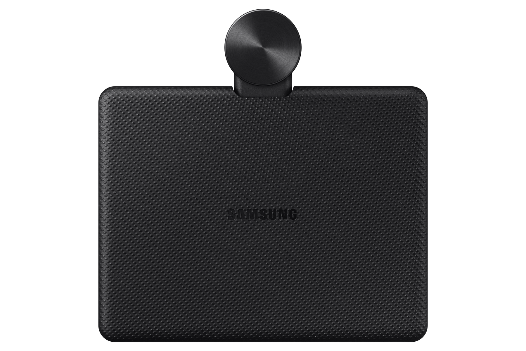 Base de carga inalámbrica Samsung negra con superficie texturizada y acento circular.