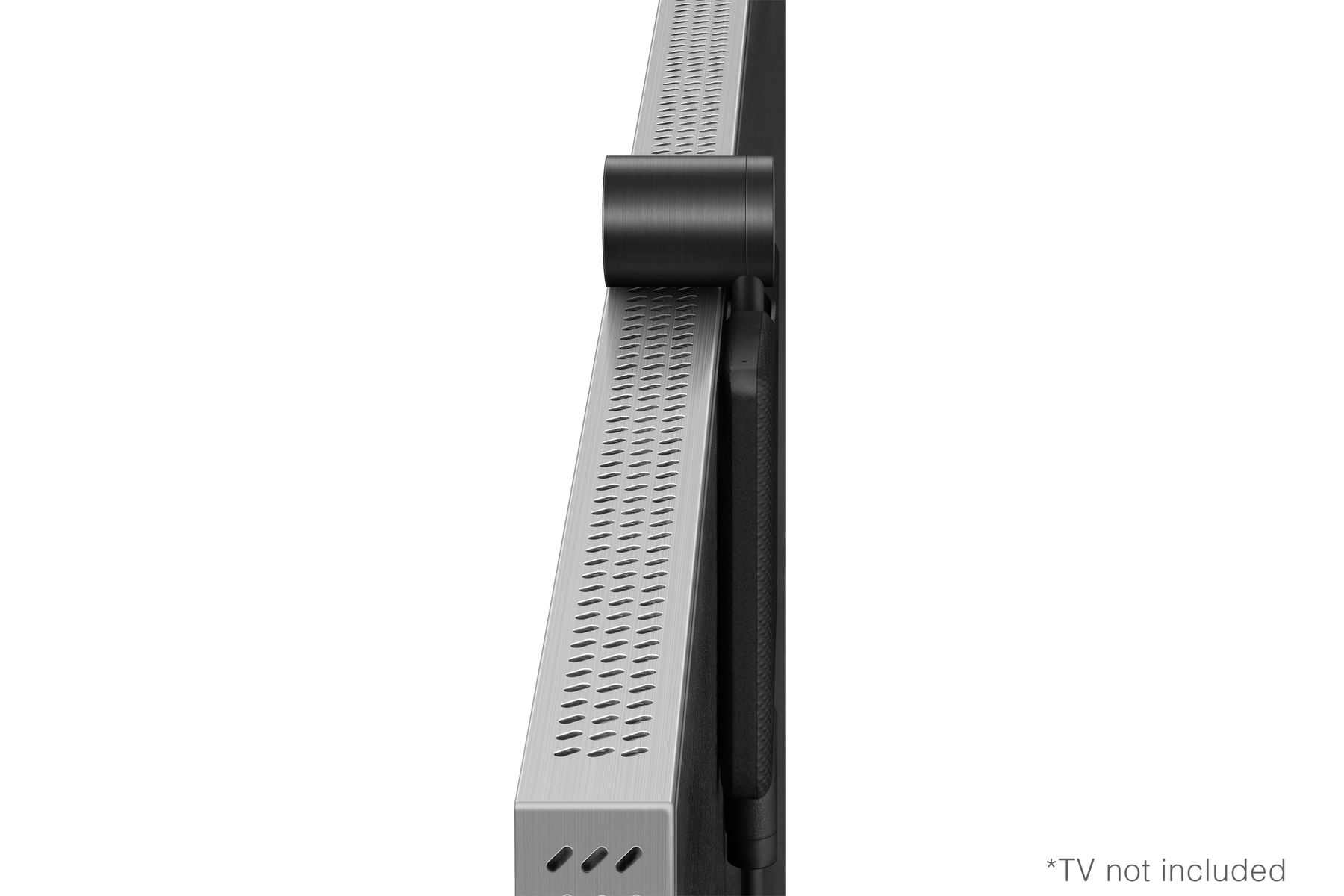 Una barra de sonido de TV plateada y negra montada en un televisor negro. *TV no incluido* texto.