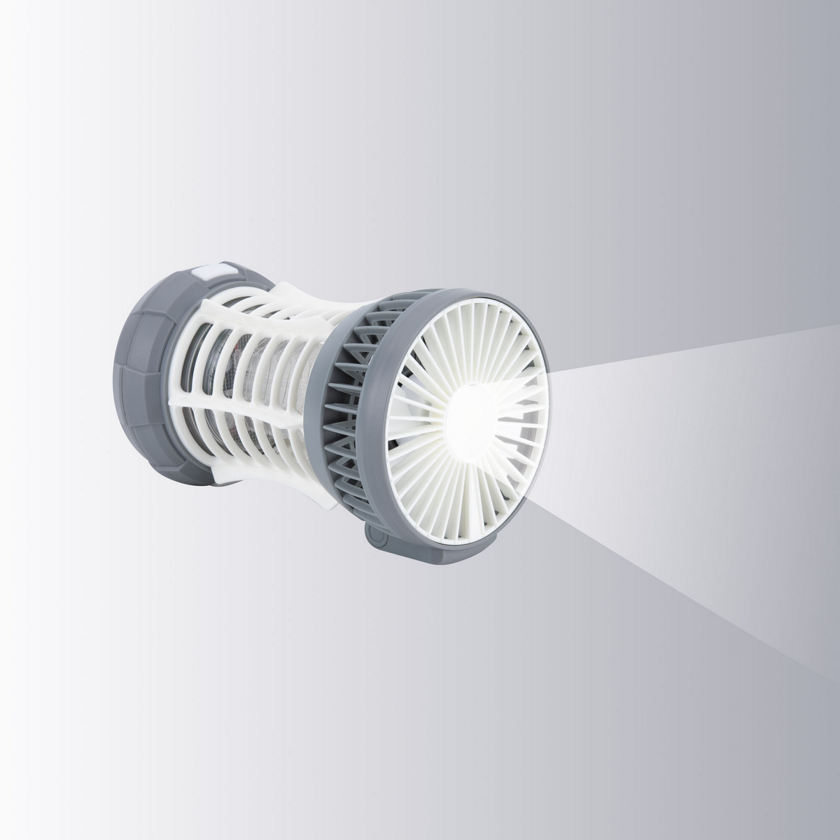 Un dispositivo blanco y gris en forma de ventilador con un haz de luz que se proyecta desde el centro.