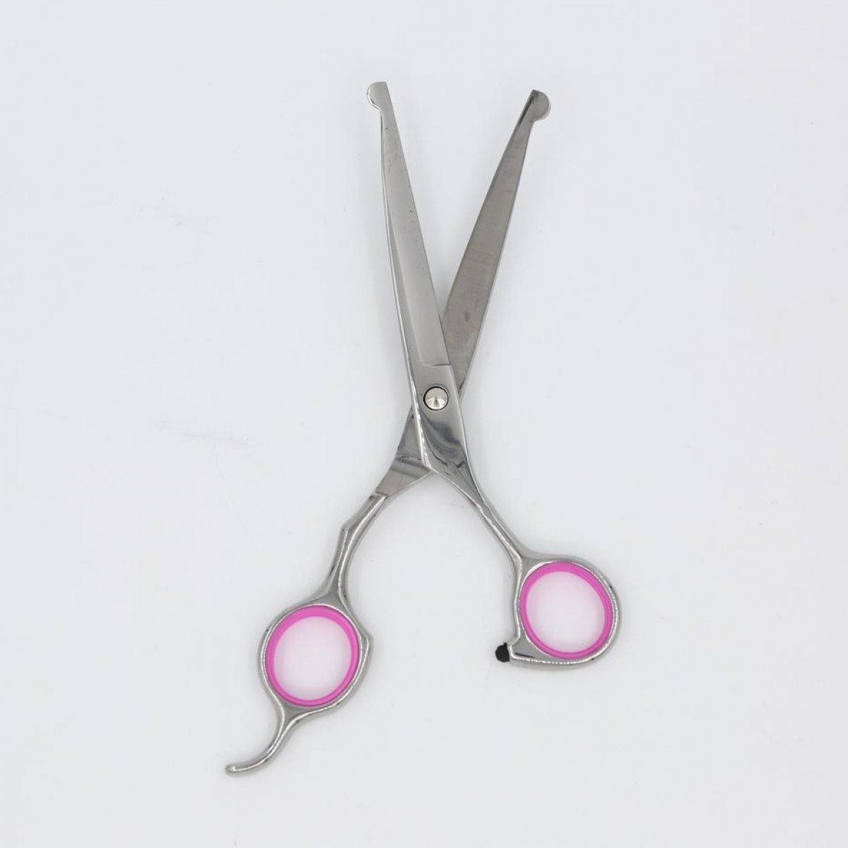 A pair of open scissors with pink accents on the handles, on a white background.
