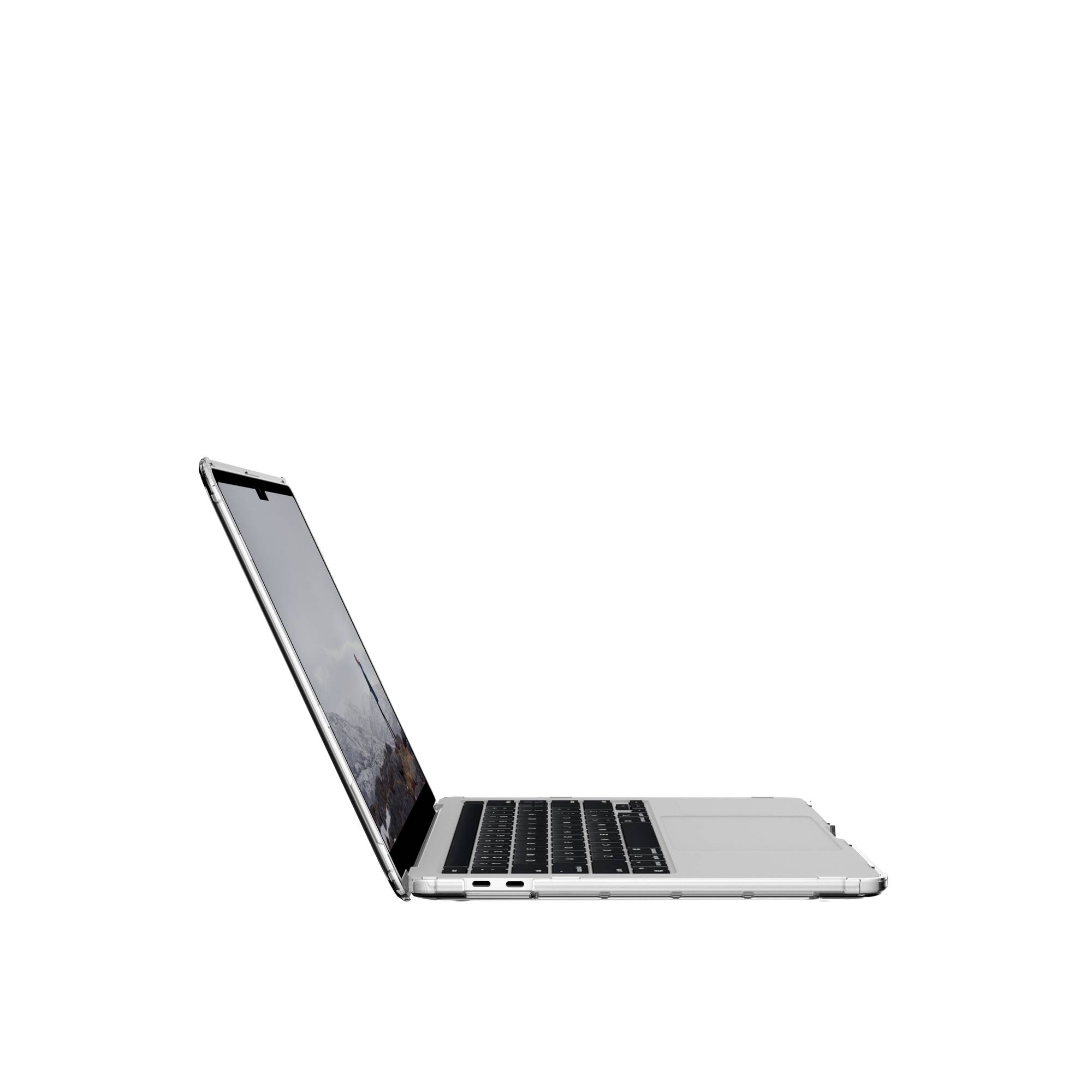 Srebrny laptop z boku, otwarty, pokazujący ekran z obrazem krajobrazu.