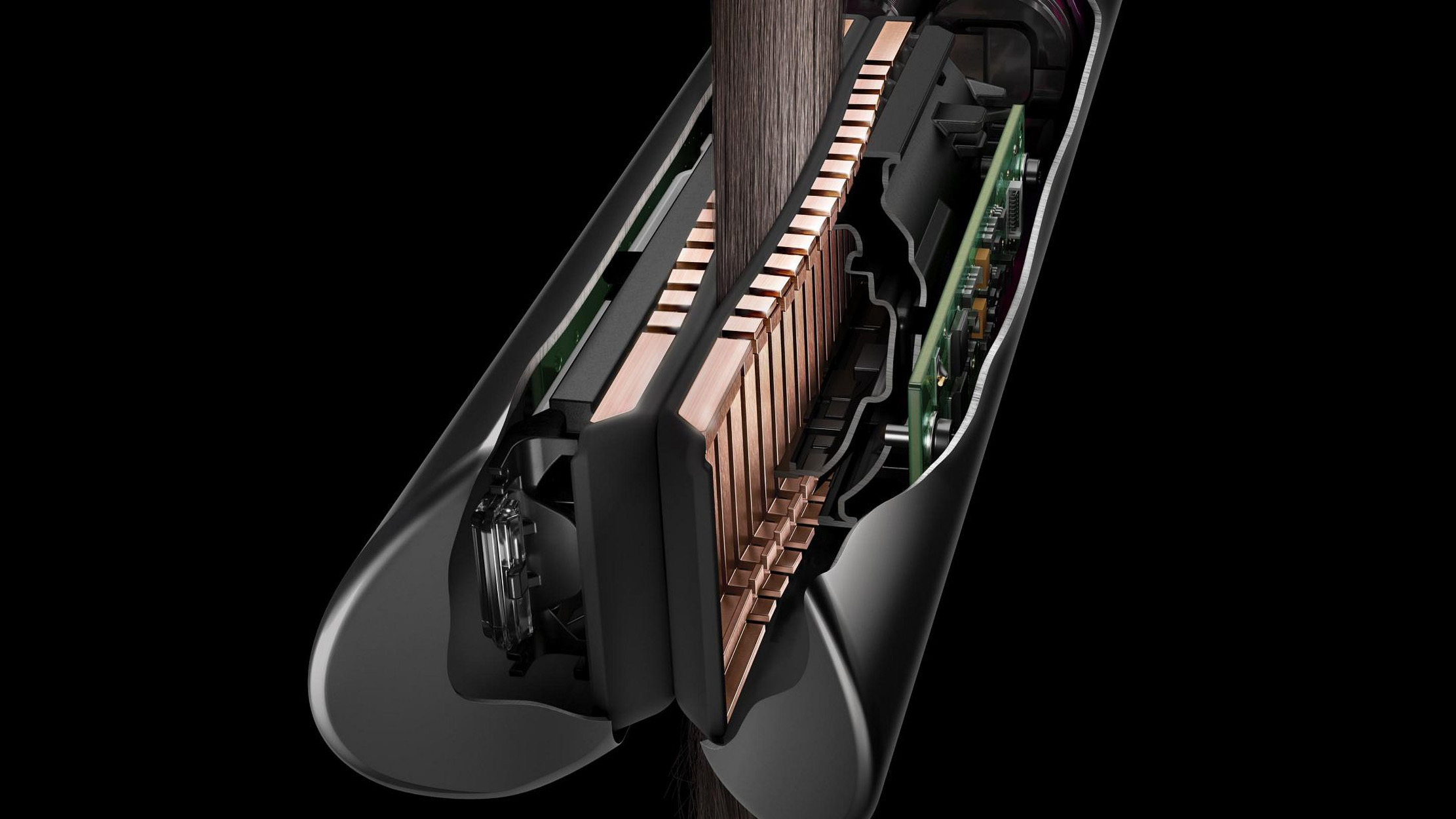 Wnętrze prostownicy, pokazujące elementy grzejne i komponenty wewnętrzne.