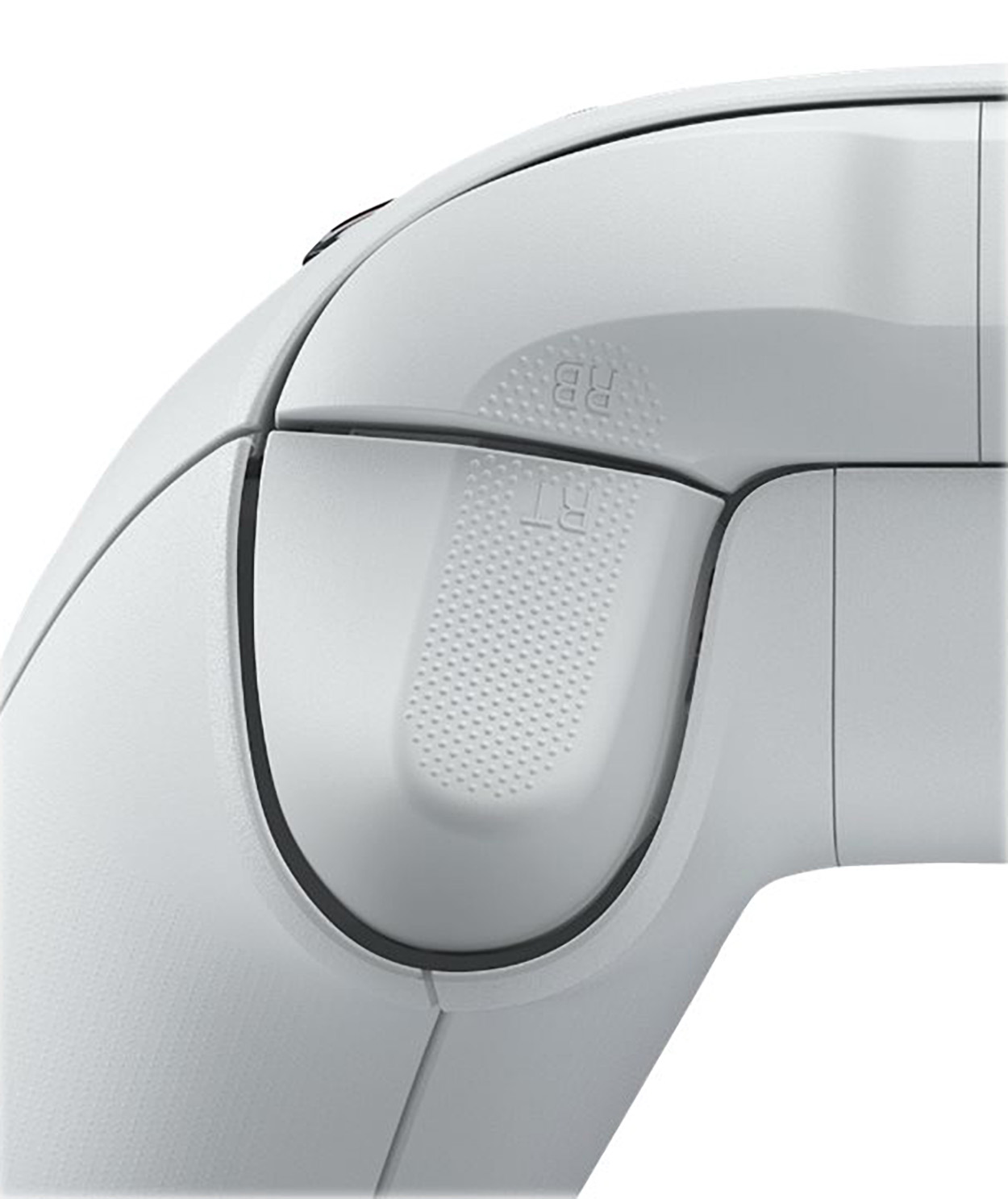 Close-up van een witte gamecontroller met getextureerde knoppen. RB en RT staan ​​bovenop.