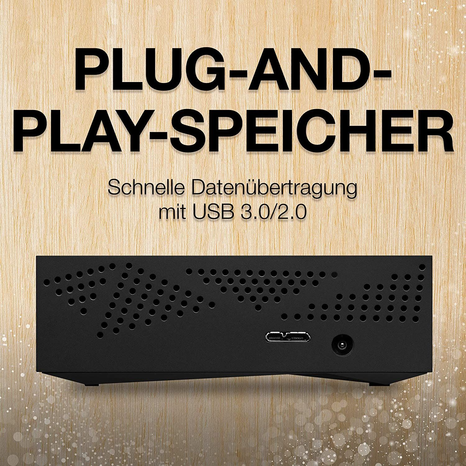 Eine schwarze externe Festplatte mit dem Worten PLUG-AND-PLAY-SPEICHER darüber.