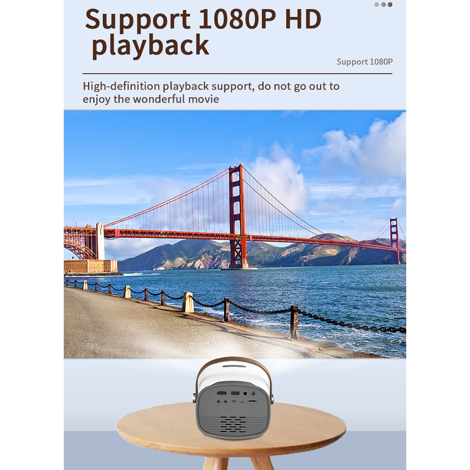 Un proyector sobre una mesa muestra el puente Golden Gate. El texto dice 'Support 1080P HD playback'.