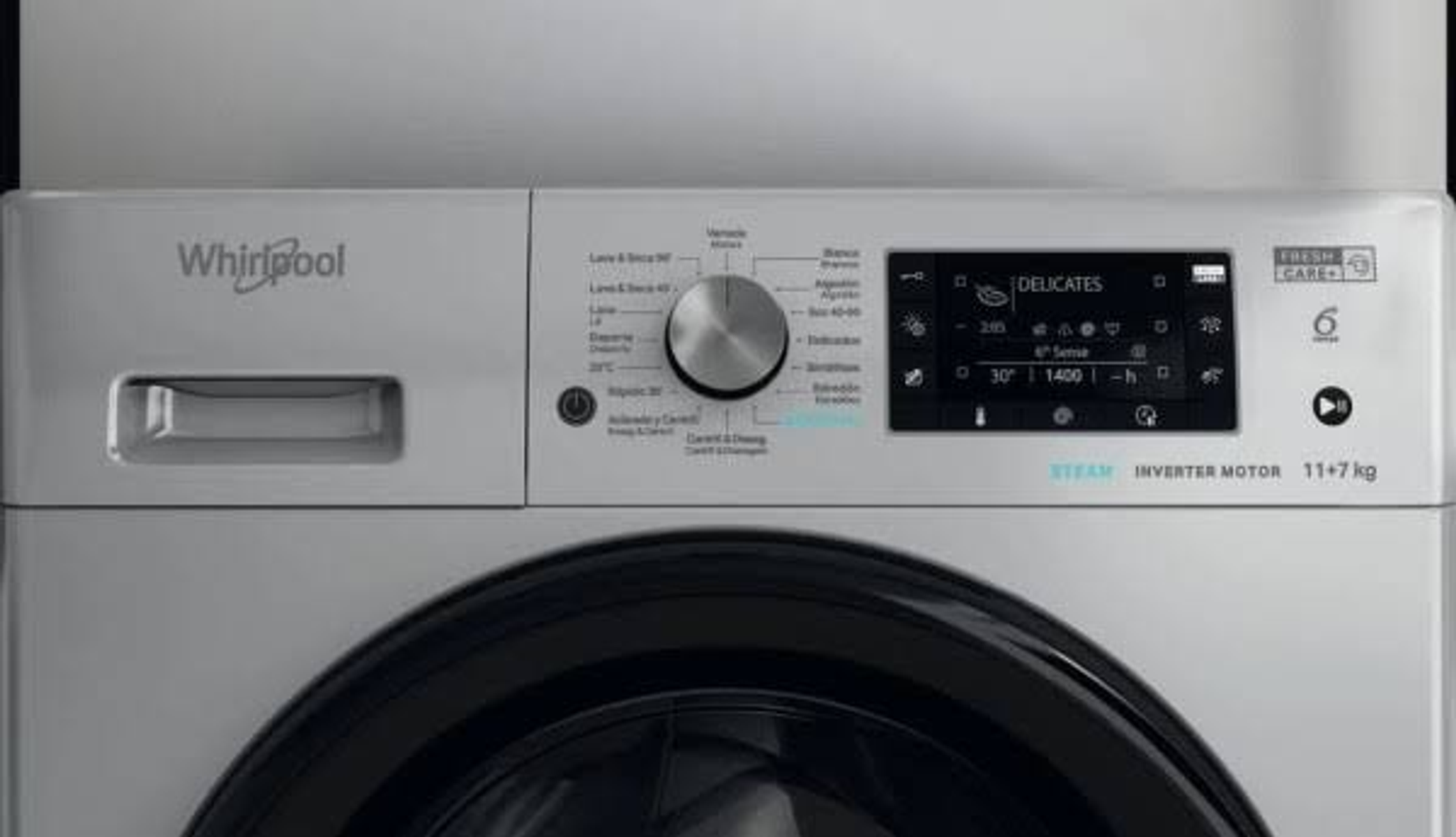 Panel de control de la lavadora Whirlpool. El panel muestra la configuración y los botones de la máquina.