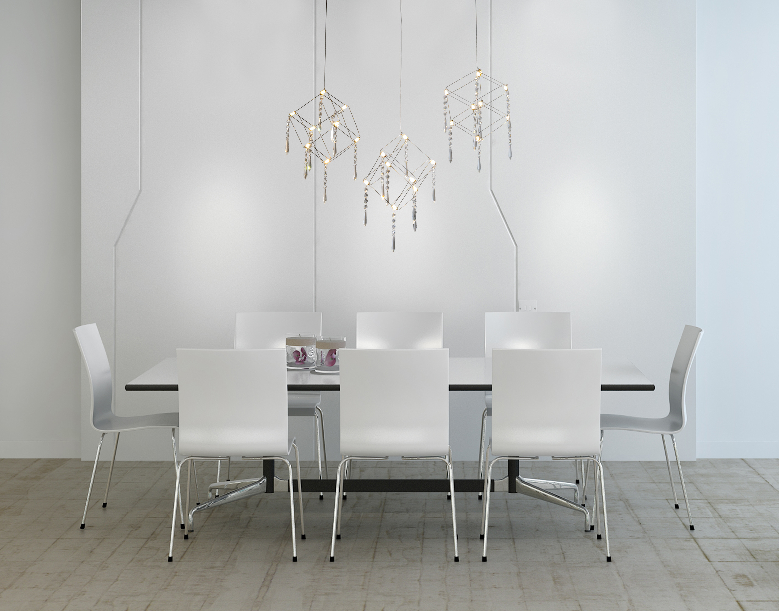 Ein Esszimmer mit weißem Tisch, Stühlen und Hängelampen mit modernem Design.