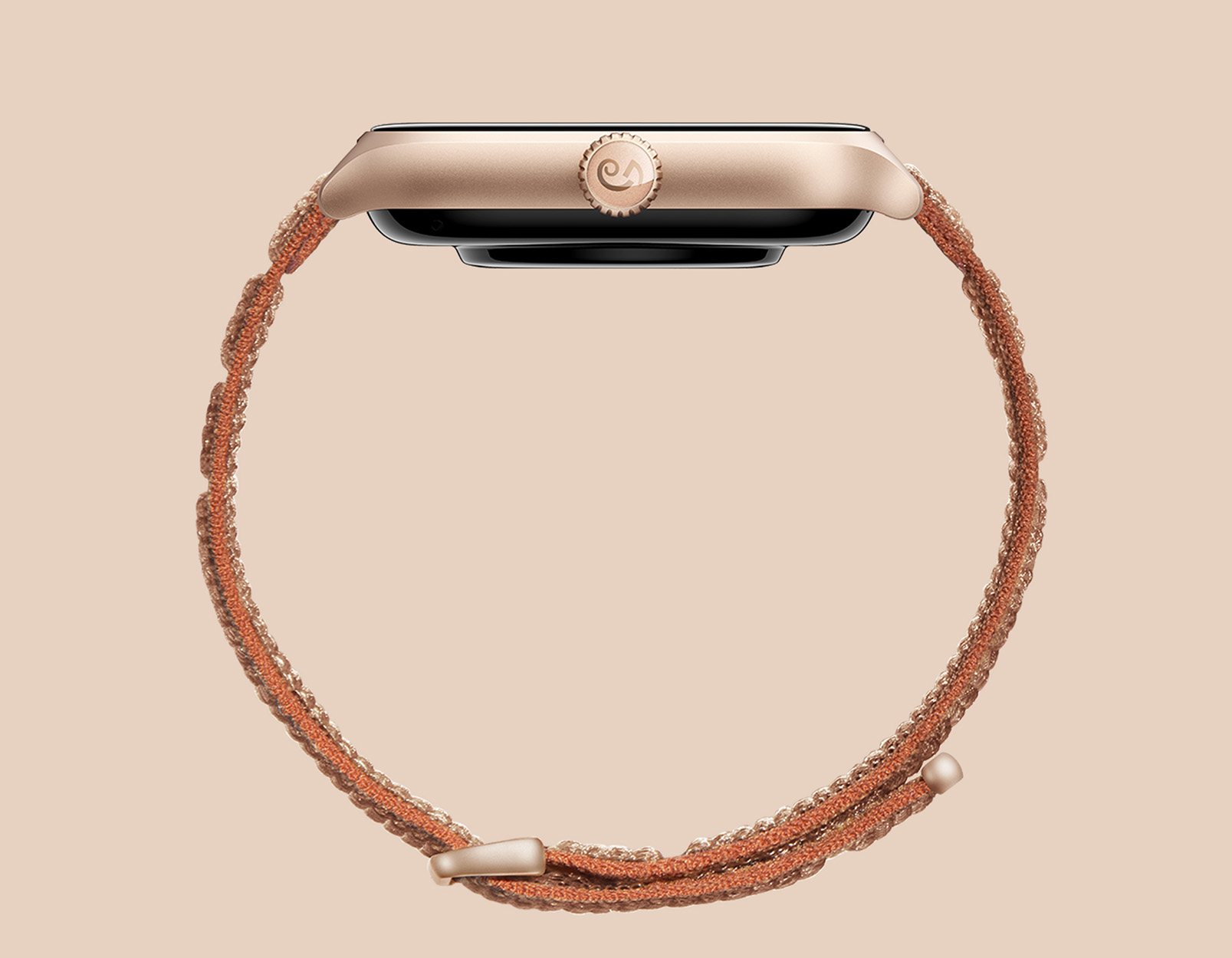 Uno smartwatch oro rosa con un cinturino intrecciato marrone.