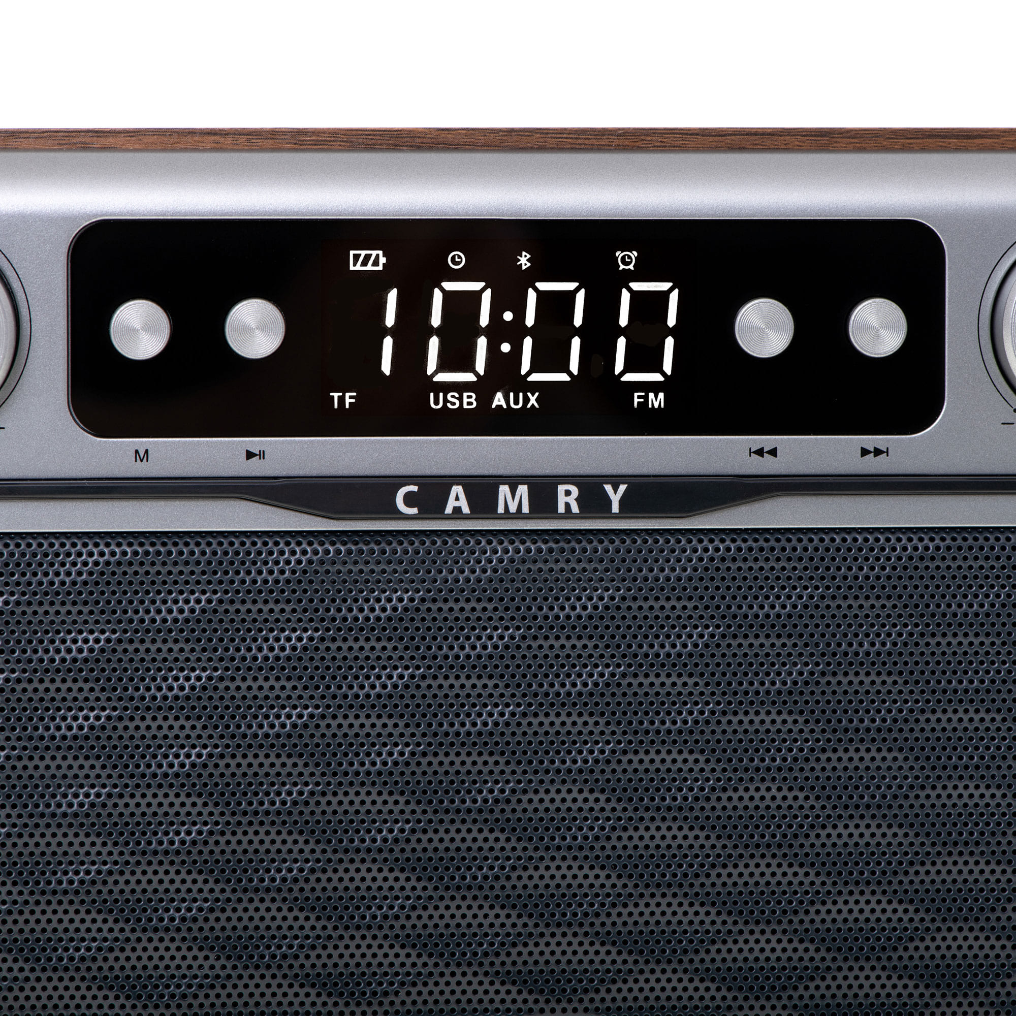 Digital radio with a screen displaying time. The word CAMRY is on the speaker.