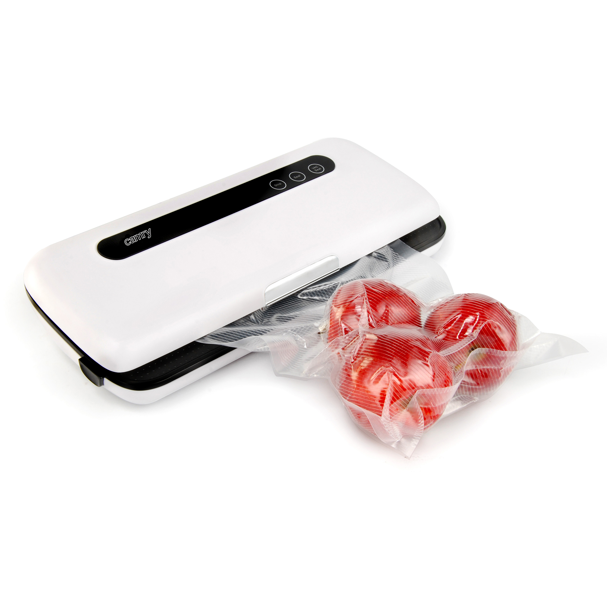 Biała zgrzewarka próżniowa z czerwonymi pomidorami zapakowanymi w przezroczystą torbę.