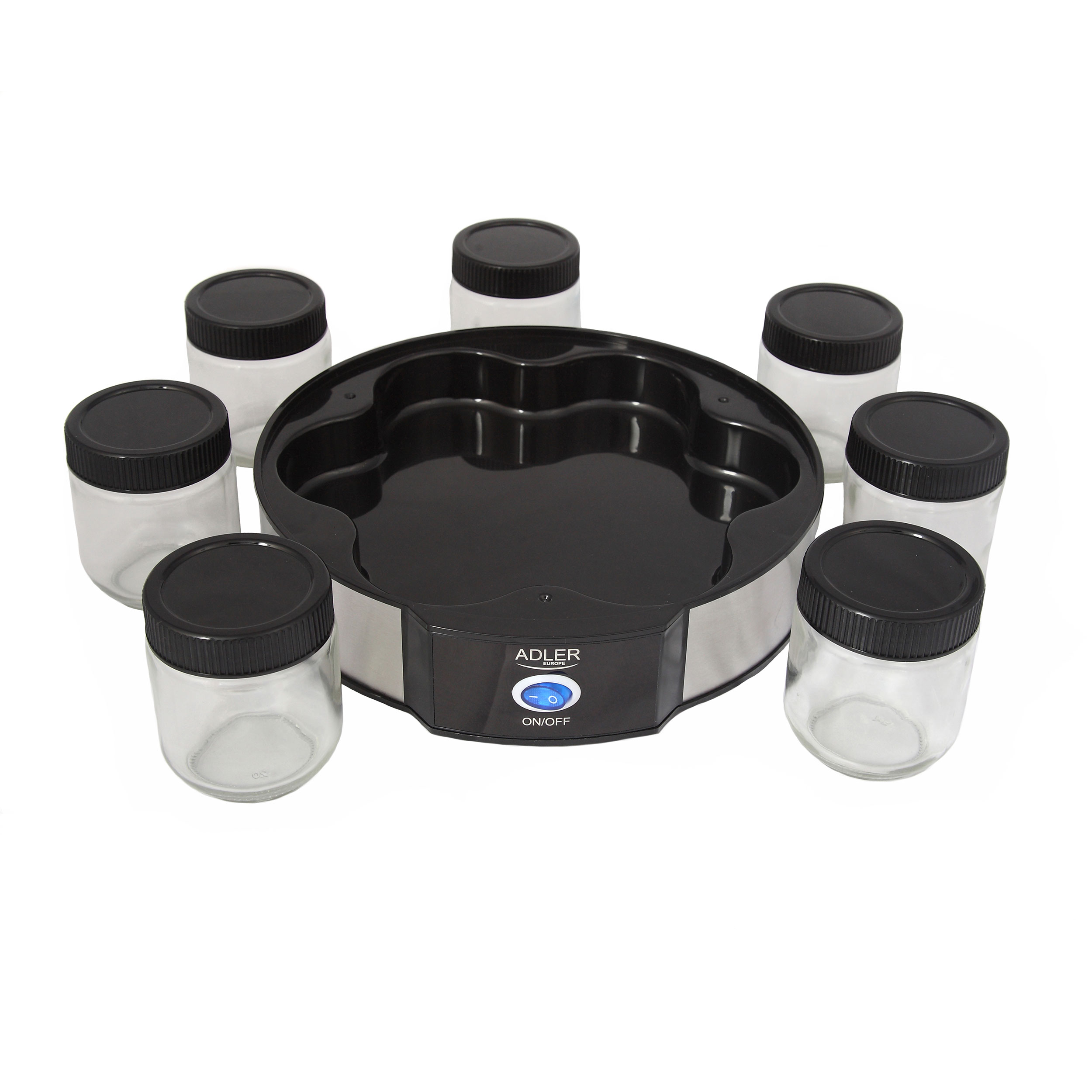 Podgrzewacz słoików ze szklanymi słoikami i czarnymi pokrywkami.