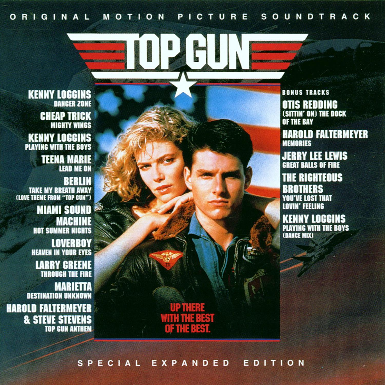 Top Gun Soundtrack-Cover. Tom Cruise und Kelly McGillis im Vordergrund. Songtitel und Logos im Hintergrund.