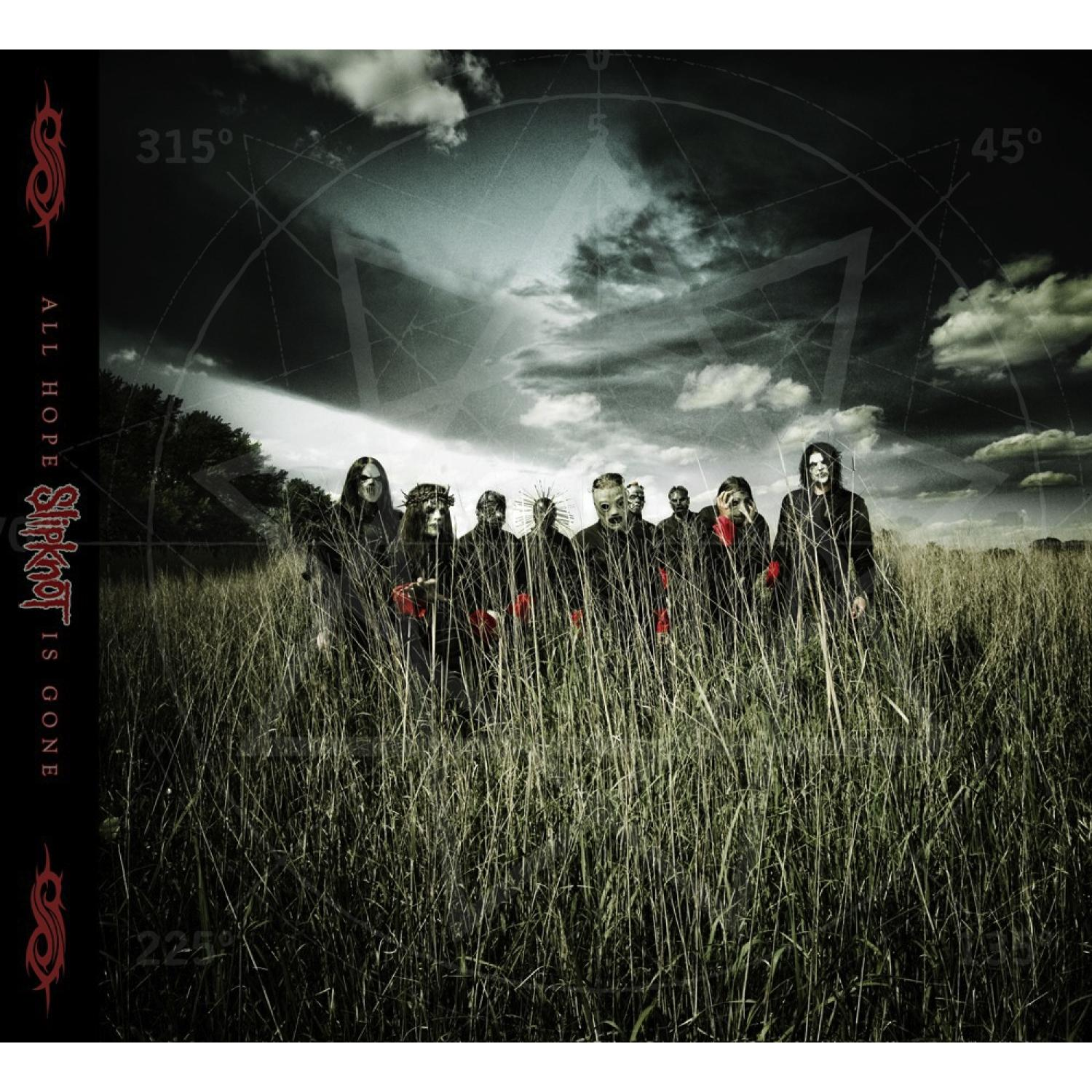 Album-Cover: Band im hohen Grasfeld. Dunkler Himmel mit geometrischem Design.