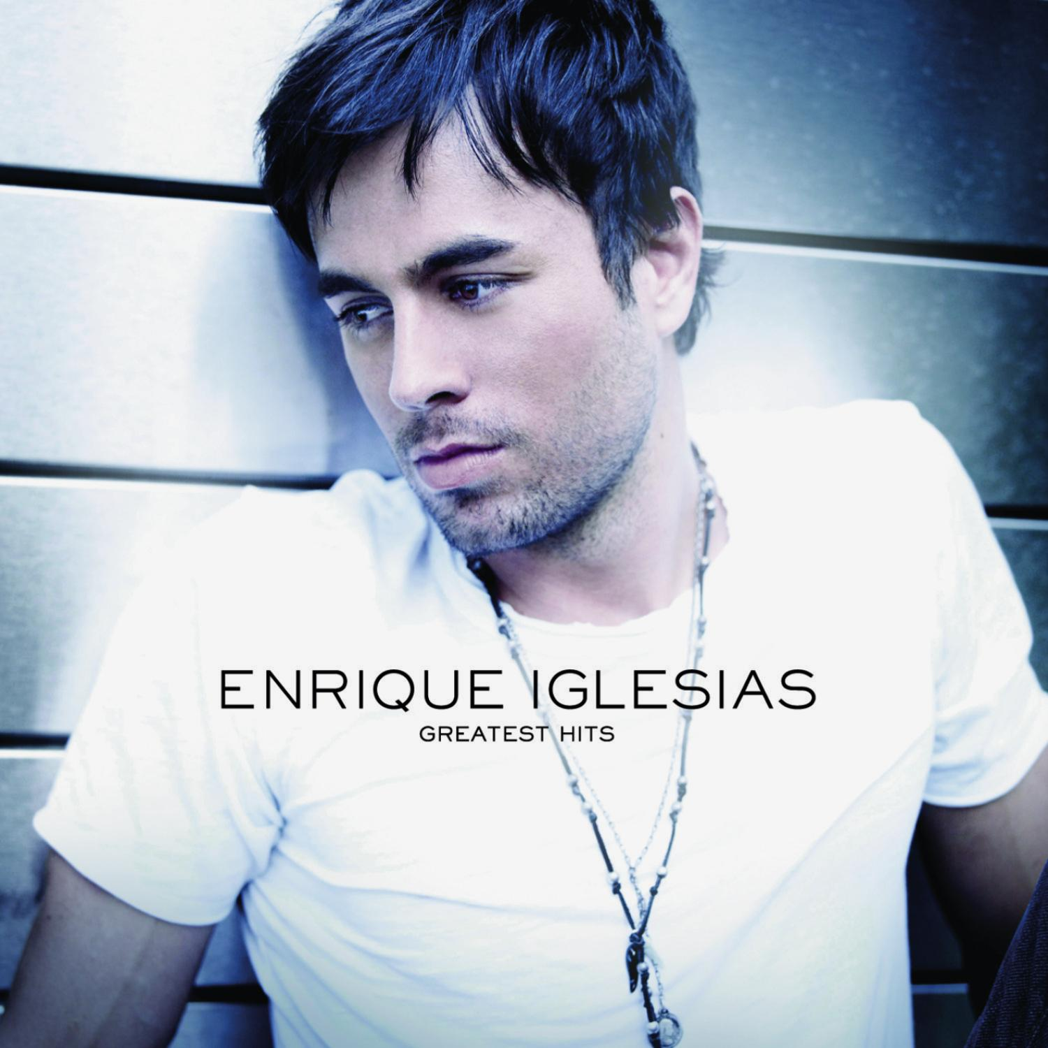 Enrique Iglesias Albumcover. Er schaut nach unten. Text: Enrique Iglesias Greatest Hits. Hintergrund ist Metall.